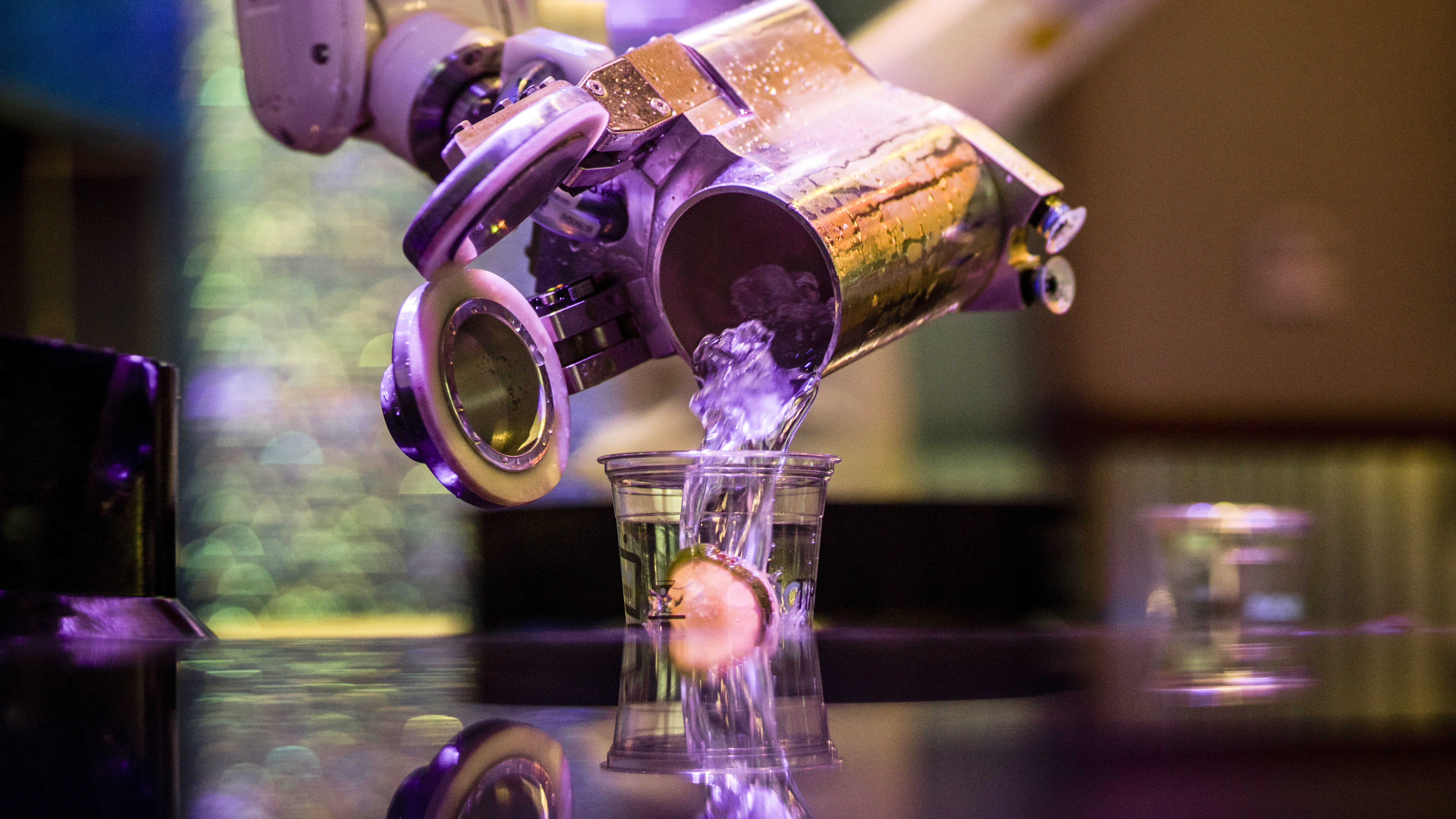 Robotic arms make cocktails at The Tipsy Robot in Las Vegas. The bar allows customers to create numerous drink combinations after placing their order though an app.