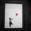 'We Just Got Banksy-ed': 'Girl With Balloon' Sells For $1.4M Before Self-Destructing