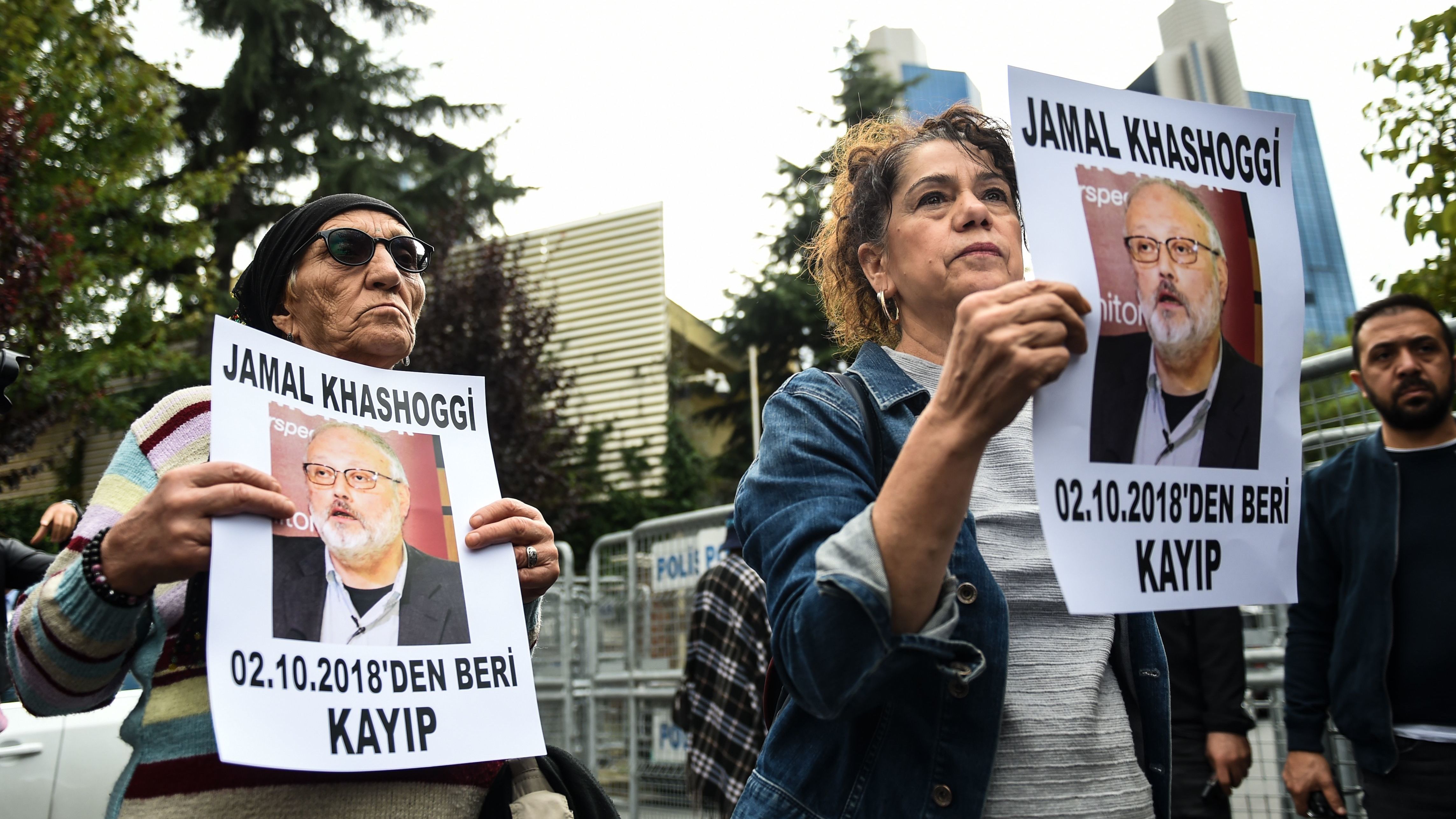 Protesters outside Saudi Arabia's consulate in Istanbul hold portraits of missing journalist Jamal Khashoggi, who disappeared after visiting the consulate last week. Turkish officials say a squad of Saudi men killed him. (AFP/Getty Images)