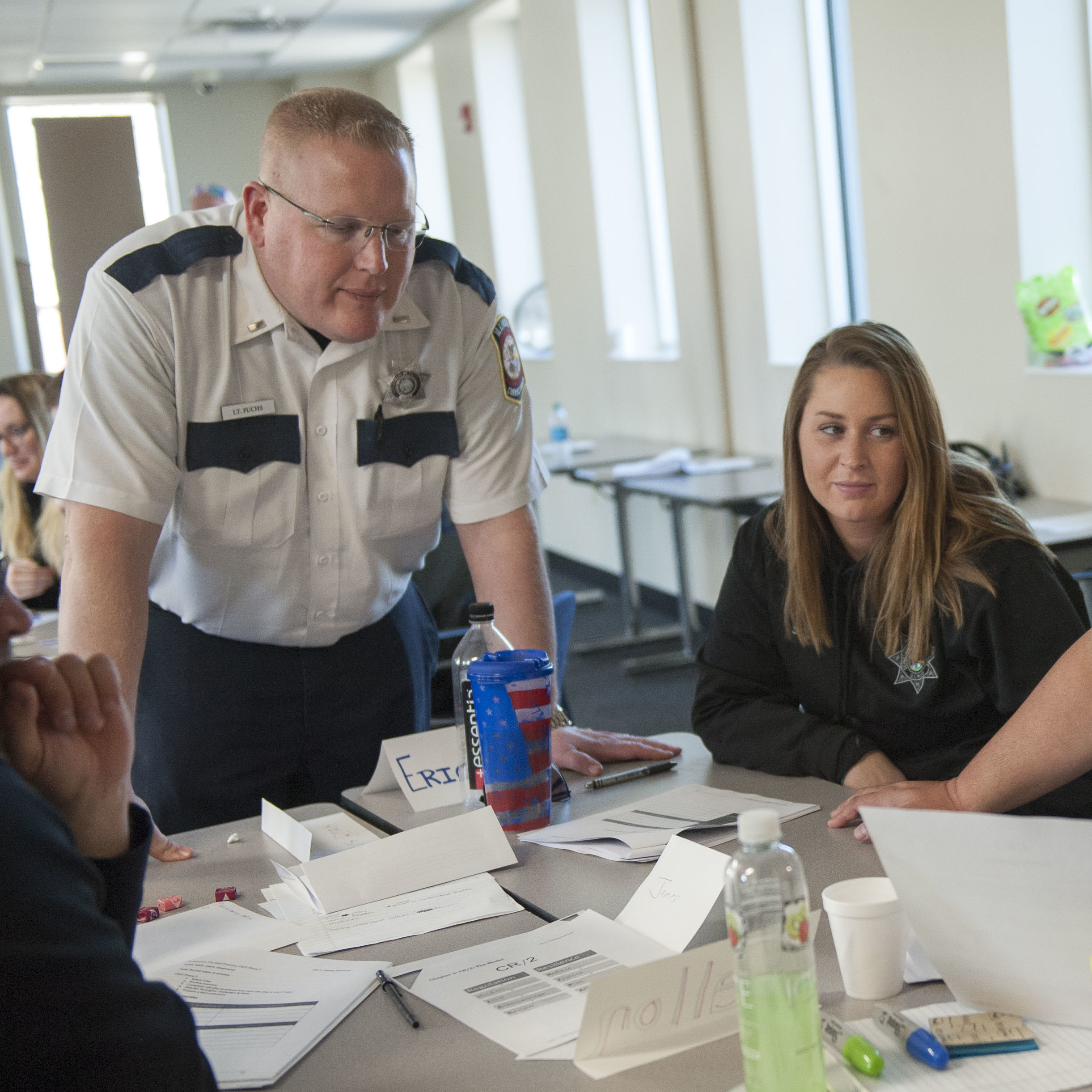 Illinois Department of Corrections officers participate in a role-playing exercise during a March training session on working with female inmates, at Logan Correctional Center in Lincoln, Ill.