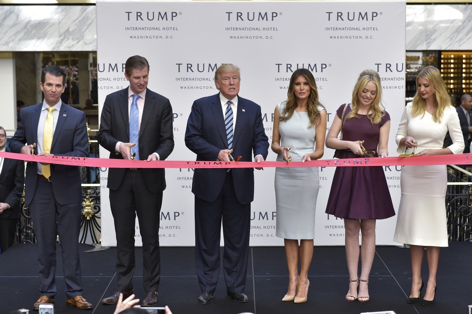 President Trump has refused to divest himself of businesses and investments that could pose conflicts of interest. For example, the Trump International Hotel (seen here), located just blocks from the White House, regularly hosts events with foreign diplomats, interest groups and industry associations. (Mandel Ngan/AFP/Getty Images)