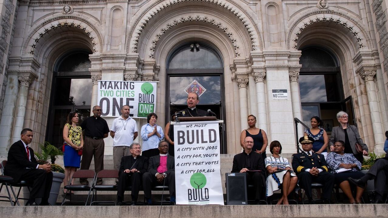 Archbishop William Lori announced a new program to issue parishioner ID cards outside a Baltimore church on Wednesday. (Catholic Review Media)
