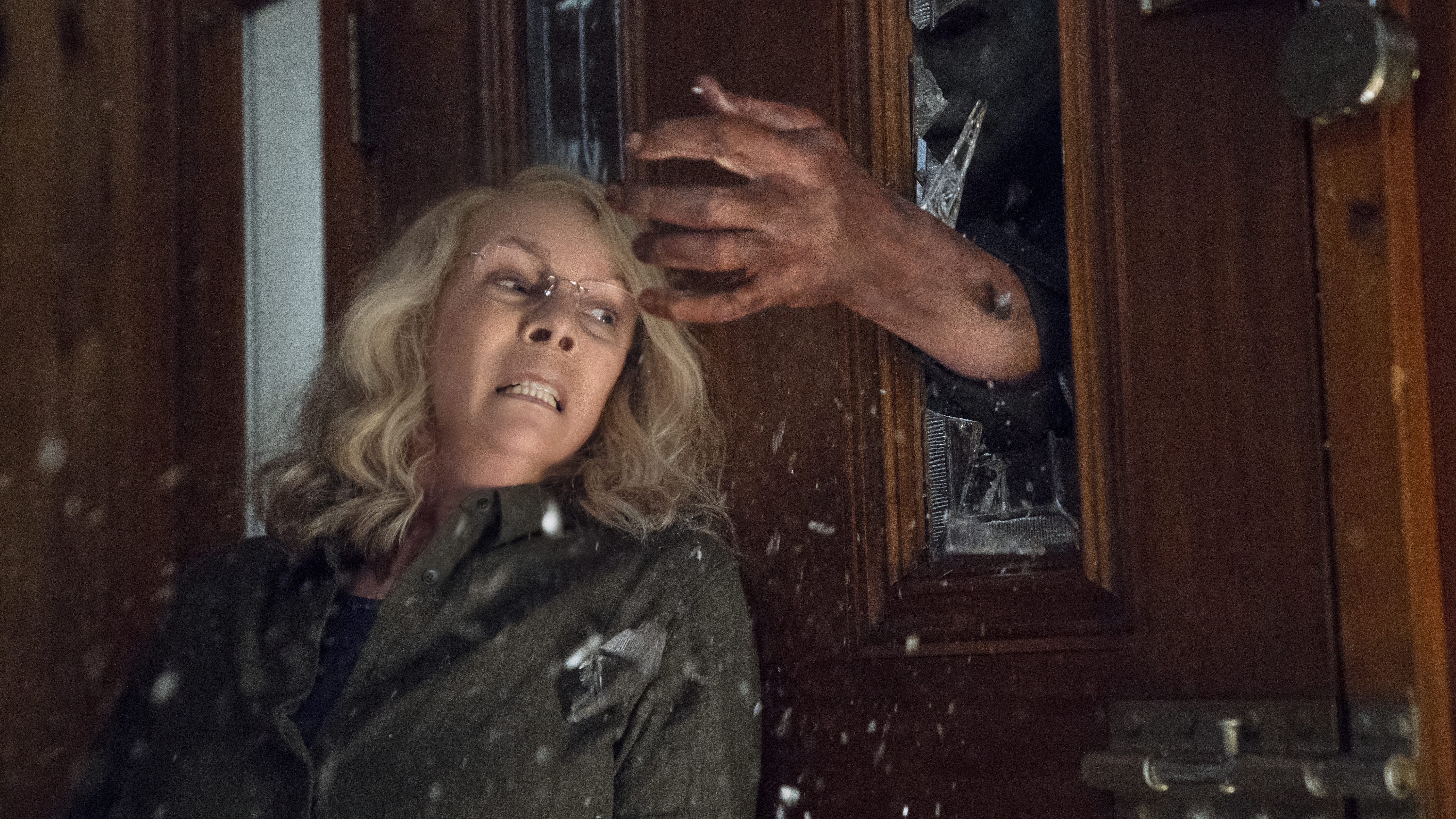 "I .. am! Your singing tel-a-gram!": Michael Myers (Nick Castle) pays a visit to Laurie Strode (Jamie Lee Curtis) in David Gordon Green
