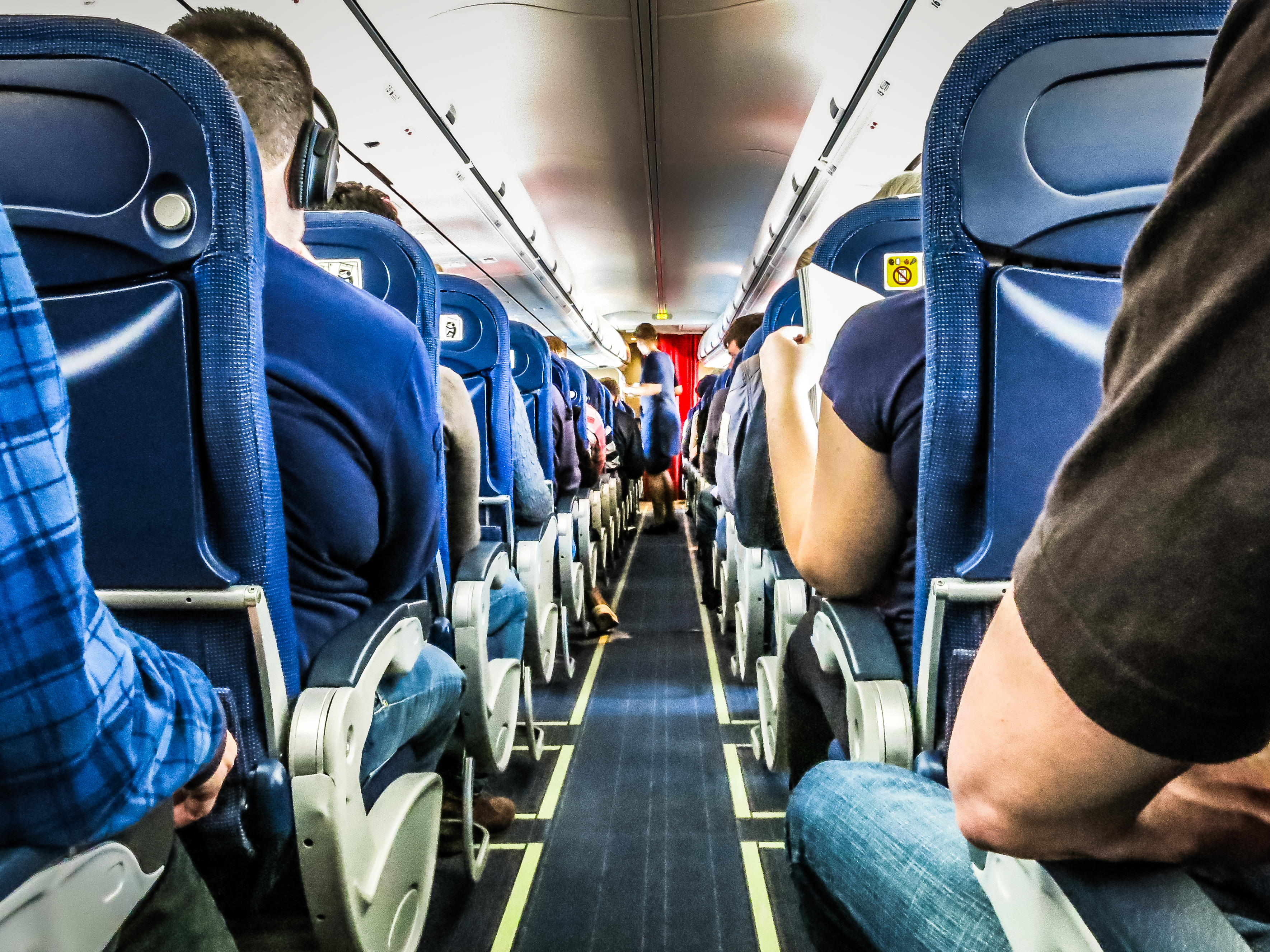 Despite a new congressional mandate to set minimum seat widths and legroom standards, the FAA is unlikely to expand airline seat size anytime soon. (Getty Images)