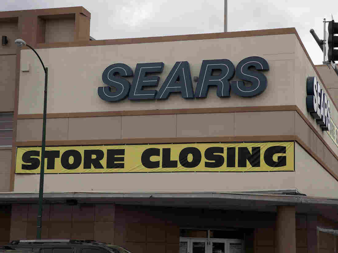 CHICAGO, IL - AUGUST 24: A poster announcing the store's closure is hanging over a Sears store on August 24, 2017 in Chicago, IL. Sears Holdings Corporation, which owns both Sears and Kmart, today announced plans to close another 28 Kmart stores. (Photo by Scott Olson / Getty Images)