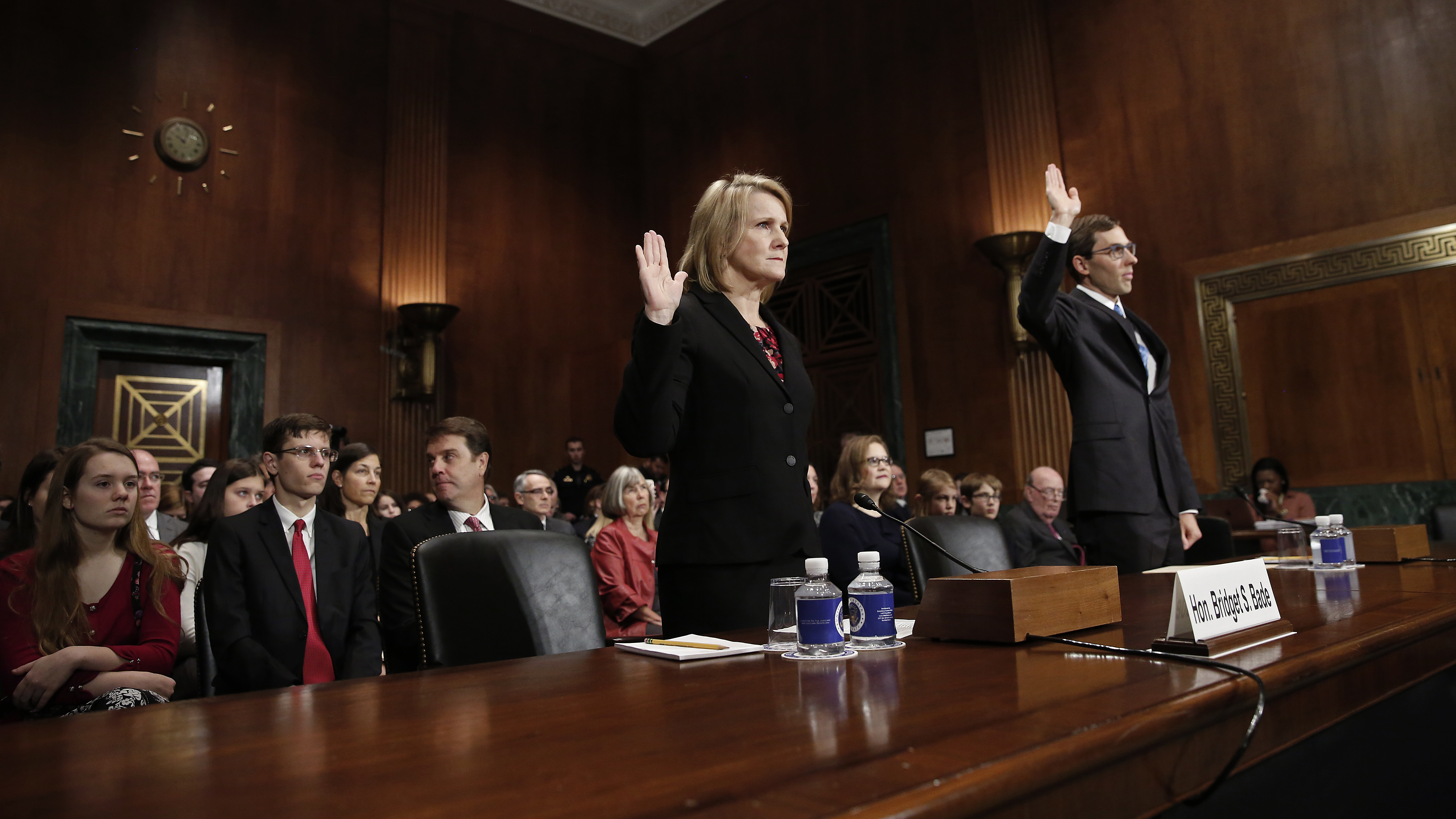 Appellate court nominees Bridget S. Bade and Eric D. Miller are sworn in during a hearing held by the Senate Judiciary Committee on Wednesday. Only two senators — Mike Crapo, R-Idaho, and Orrin Hatch, R-Utah — were in attendance. (Getty Images)