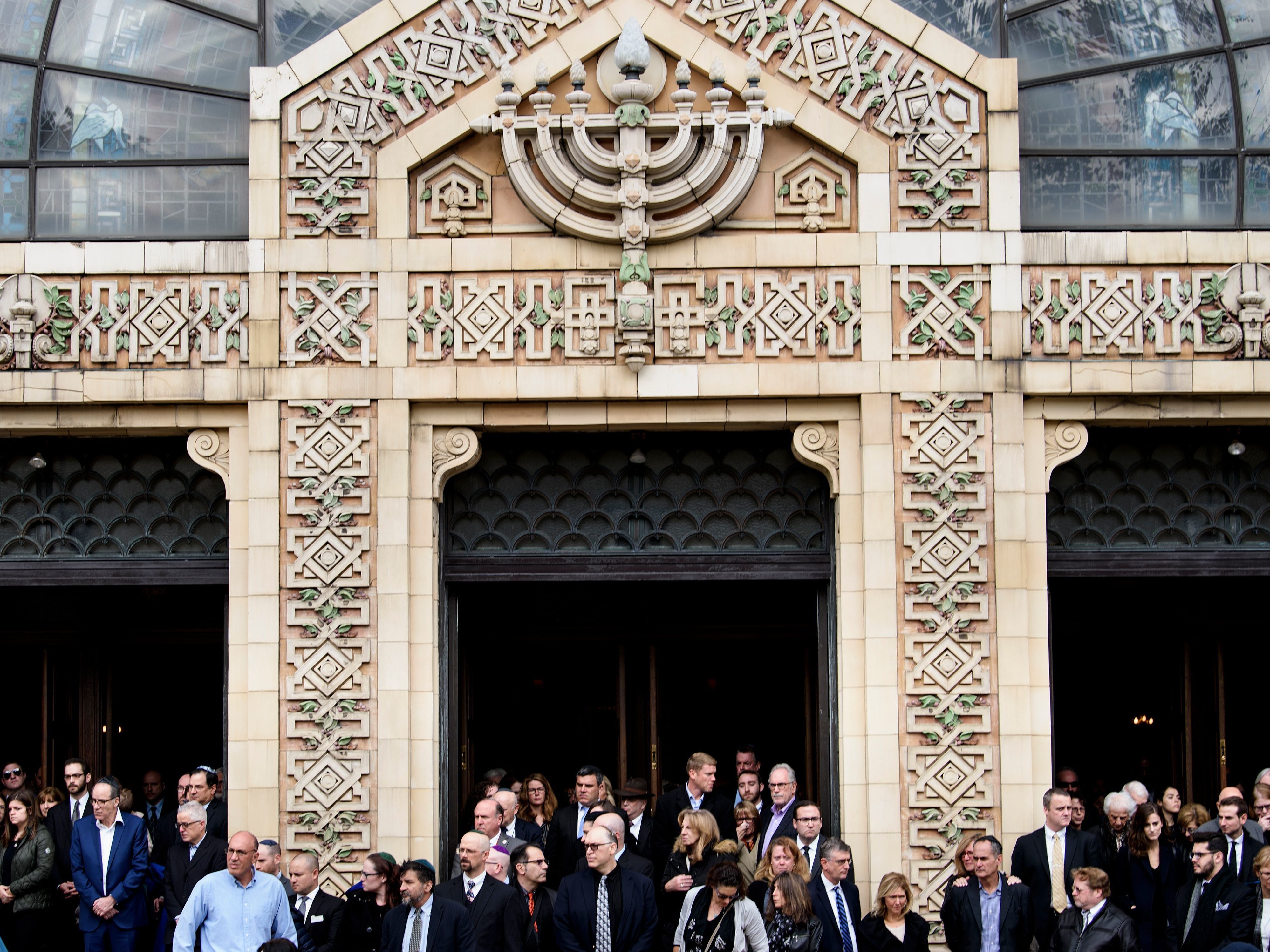 People leave Rodef Shalom Congregation after a funeral for Tree of Life Congregation mass shooting victims Cecil Rosenthal and David Rosenthal Tuesday in Pittsburgh, Pa. (AFP/Getty Images)