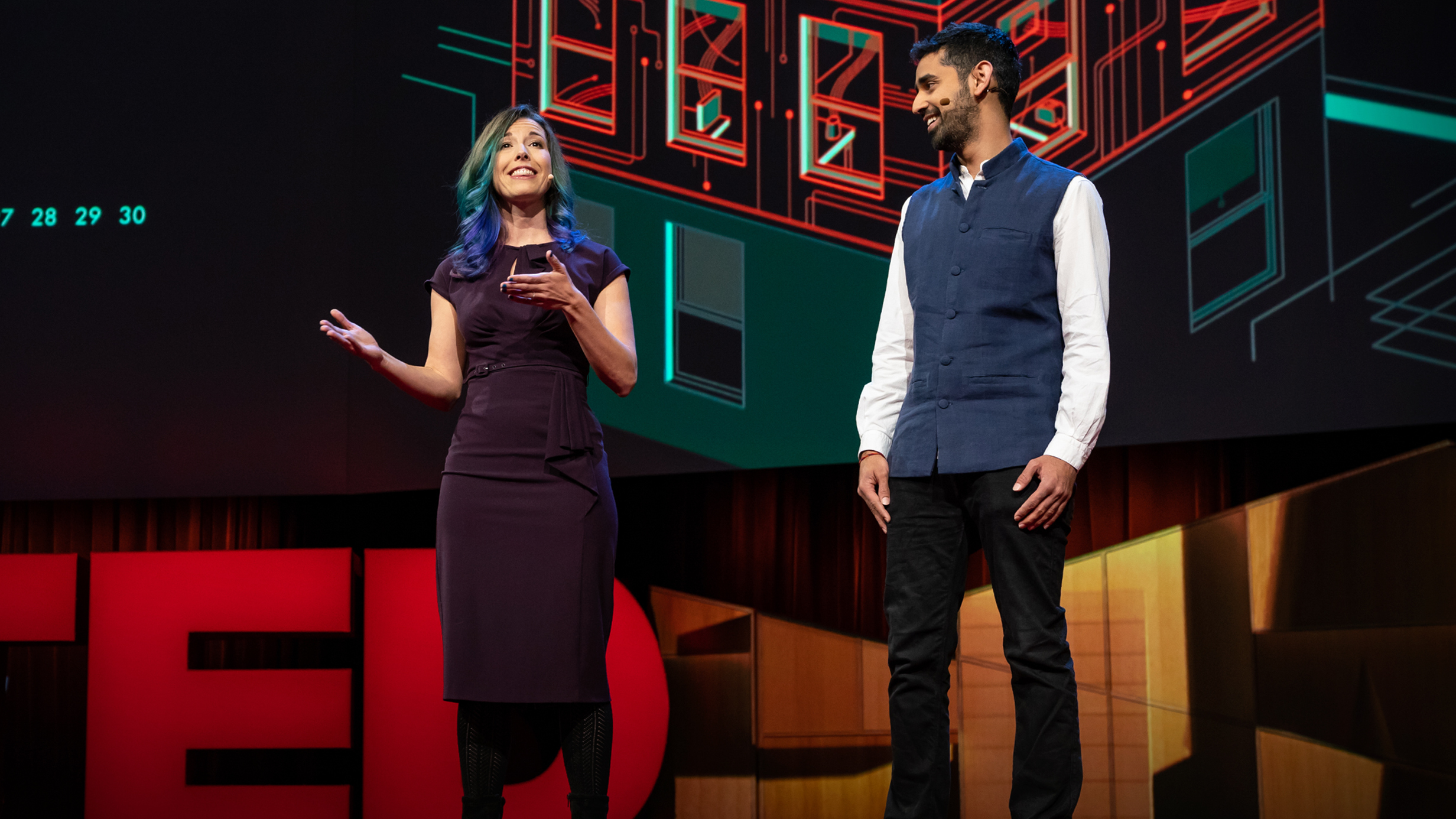 Kashmir Hill and Surya Mattu on the TED stage.