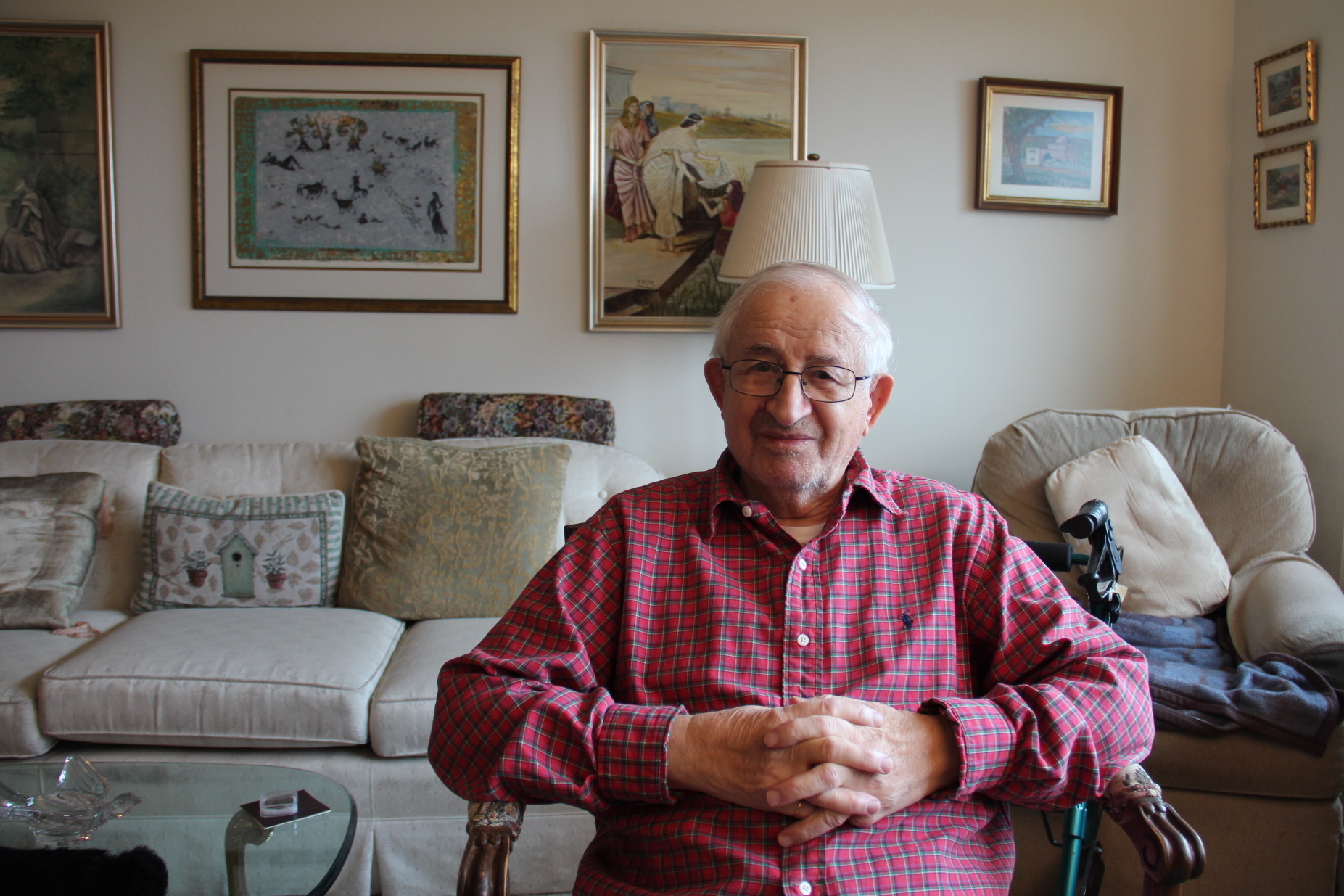 Sam Gottesman, 95, in his Squirrel Hill apartment in Pittsburgh. Gottesman survived the Holocaust, and eventually came to Pittsburgh. (Reid Frazier for NPR)