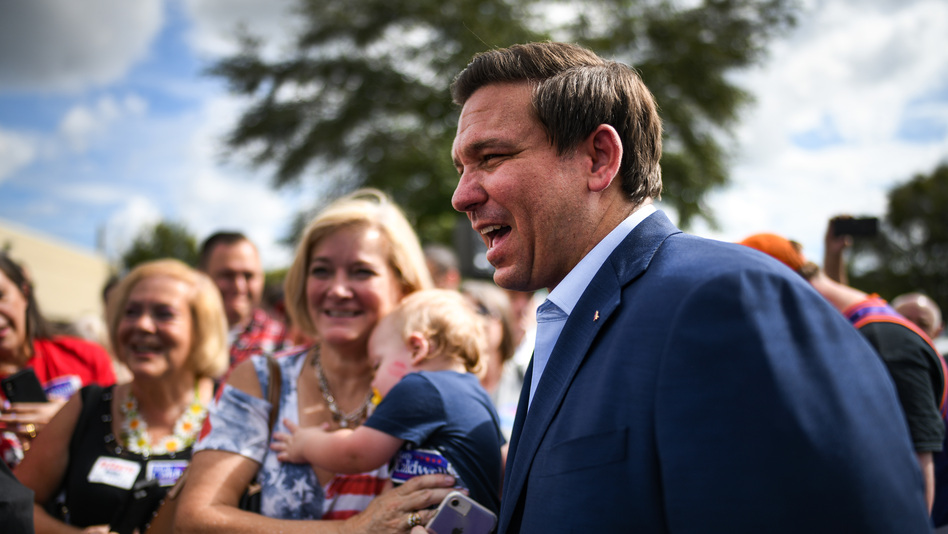 Ron DeSantis meets with supporters at a rally Monday in Orlando, Fla. (Jeff J Mitchell/Getty Images)