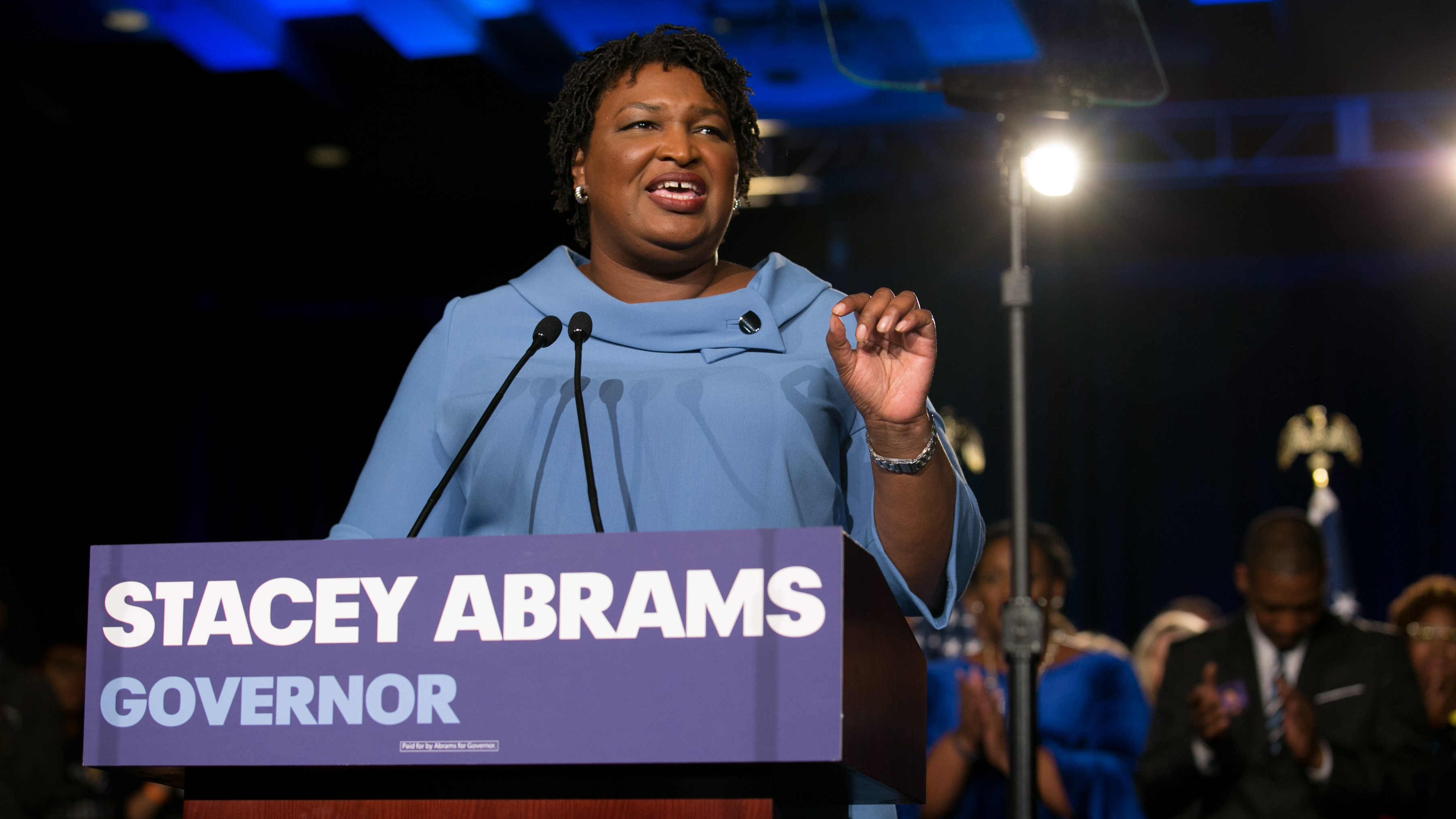 Democratic gubernatorial candidate Stacey Abrams addresses supporters at an election watch party on Tuesday. Abrams has not conceded to her Republican opponent, Brian Kemp, contending there are thousands of absentee and provisional ballots yet to be counted. (Getty Images)