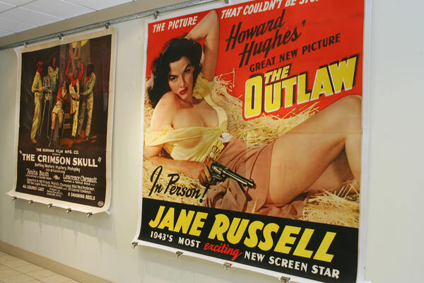 An original poster from the 1943 movie The Outlaw staring Jane Russell is shown on display at a Los Angeles auction house in December 2006.