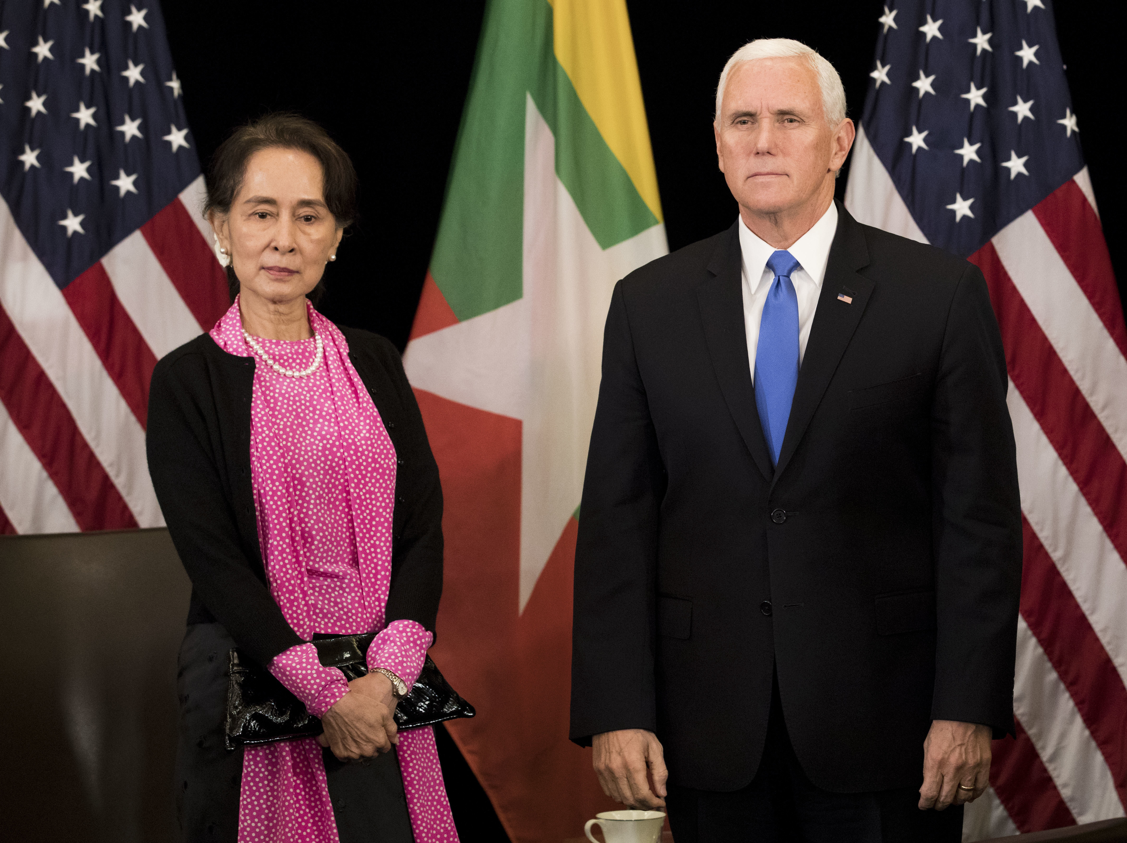Vice President Mike Pence and Myanmar State Counsellor Aung San Suu Kyi arrive for a bilateral meeting on the sidelines of the Association of Southeast Asian Nations (ASEAN) summit in Singapore on Wednesday.