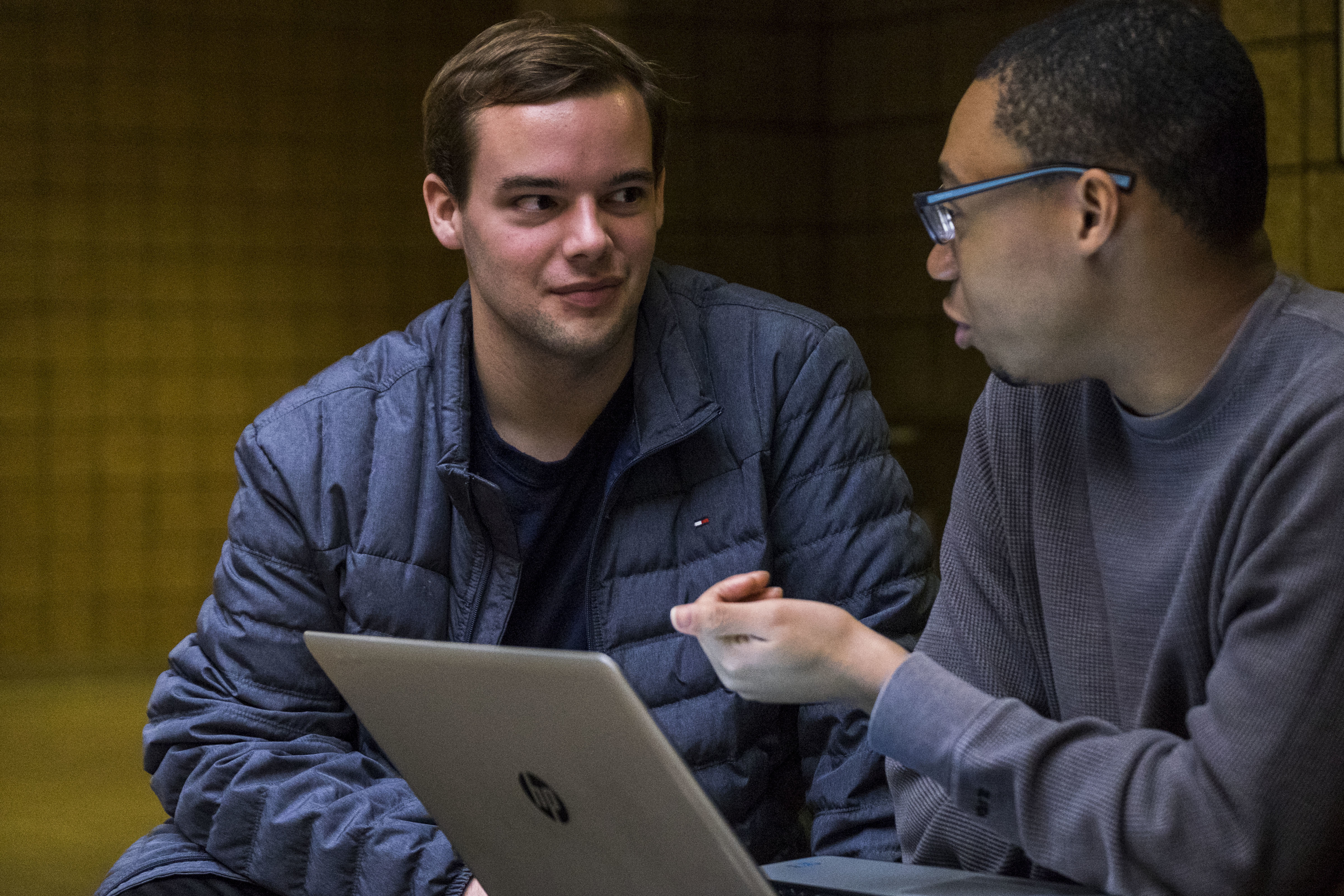 Cameron Russell (left) is a freshman at the University of Michigan from rural Louisiana. His mentor is Elijah Taylor, a senior who grew up in Detroit. (Diane Weiss for The Hechinger Report)