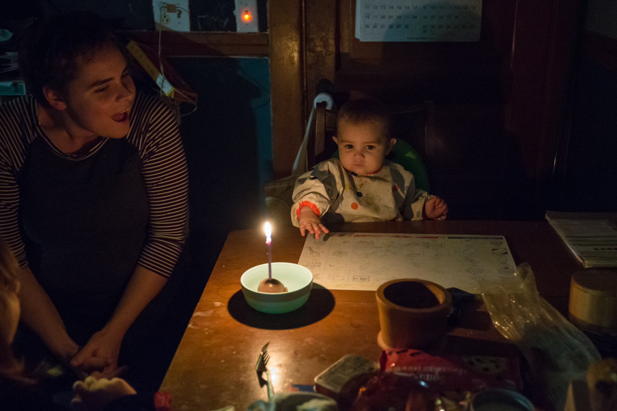 Margaret Siebers sings Happy Birthday to Frances on the baby's first birthday.