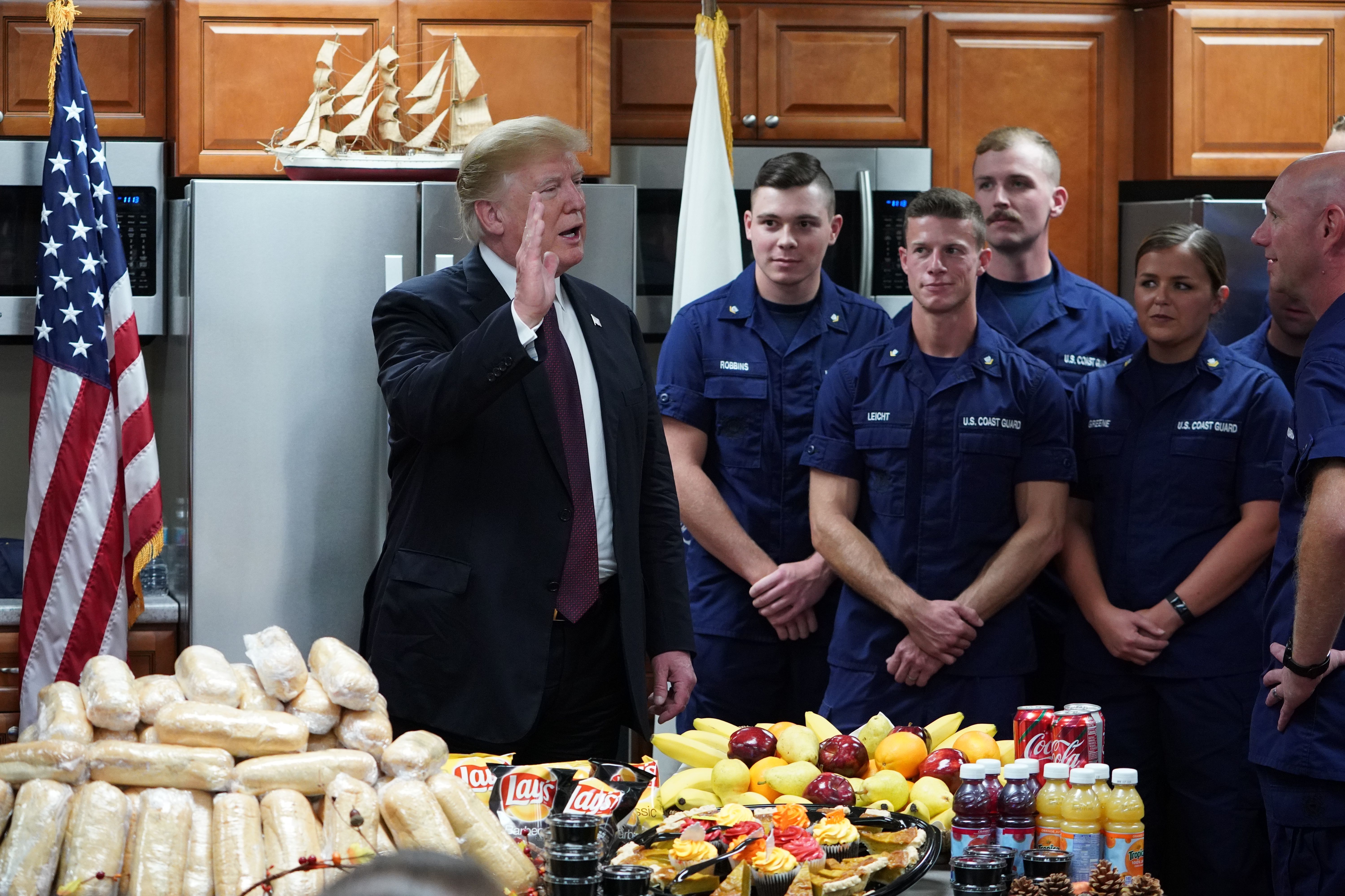 President Trump visits U.S. Coast Guard personnel in Florida on Thanksgiving. (AFP/Getty Images)
