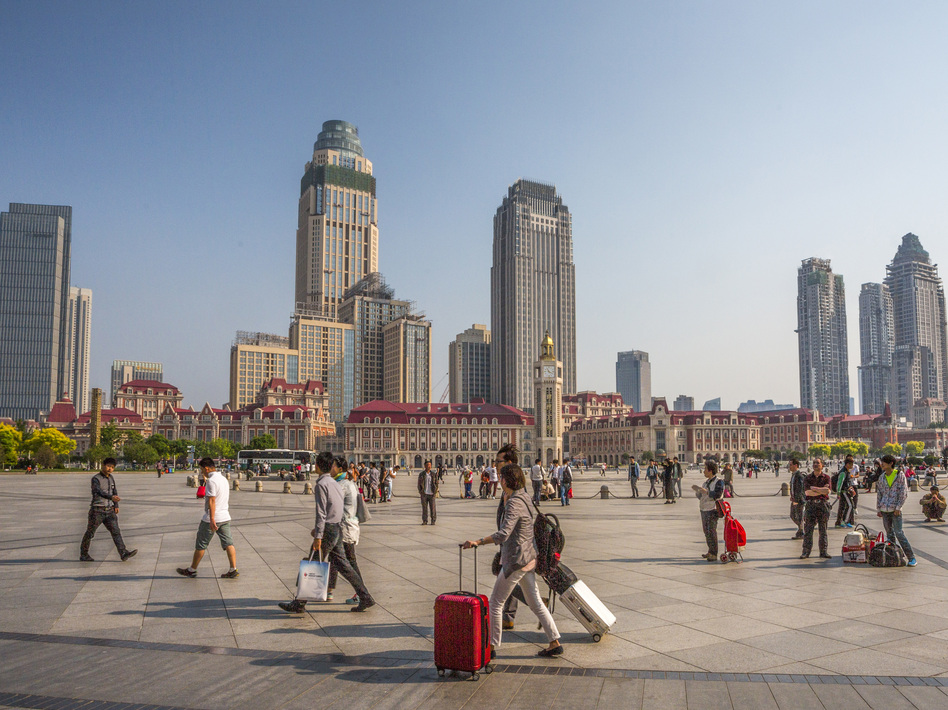 Tianjin, in northern China, is home to Tianjin University, an international research center that recently hired an American to lead its school of pharmaceutical science and technology. He recruits students from all over the world, he says, and the program's classes are taught in English. (Prisma Bildagentur/UIG/Getty Images)