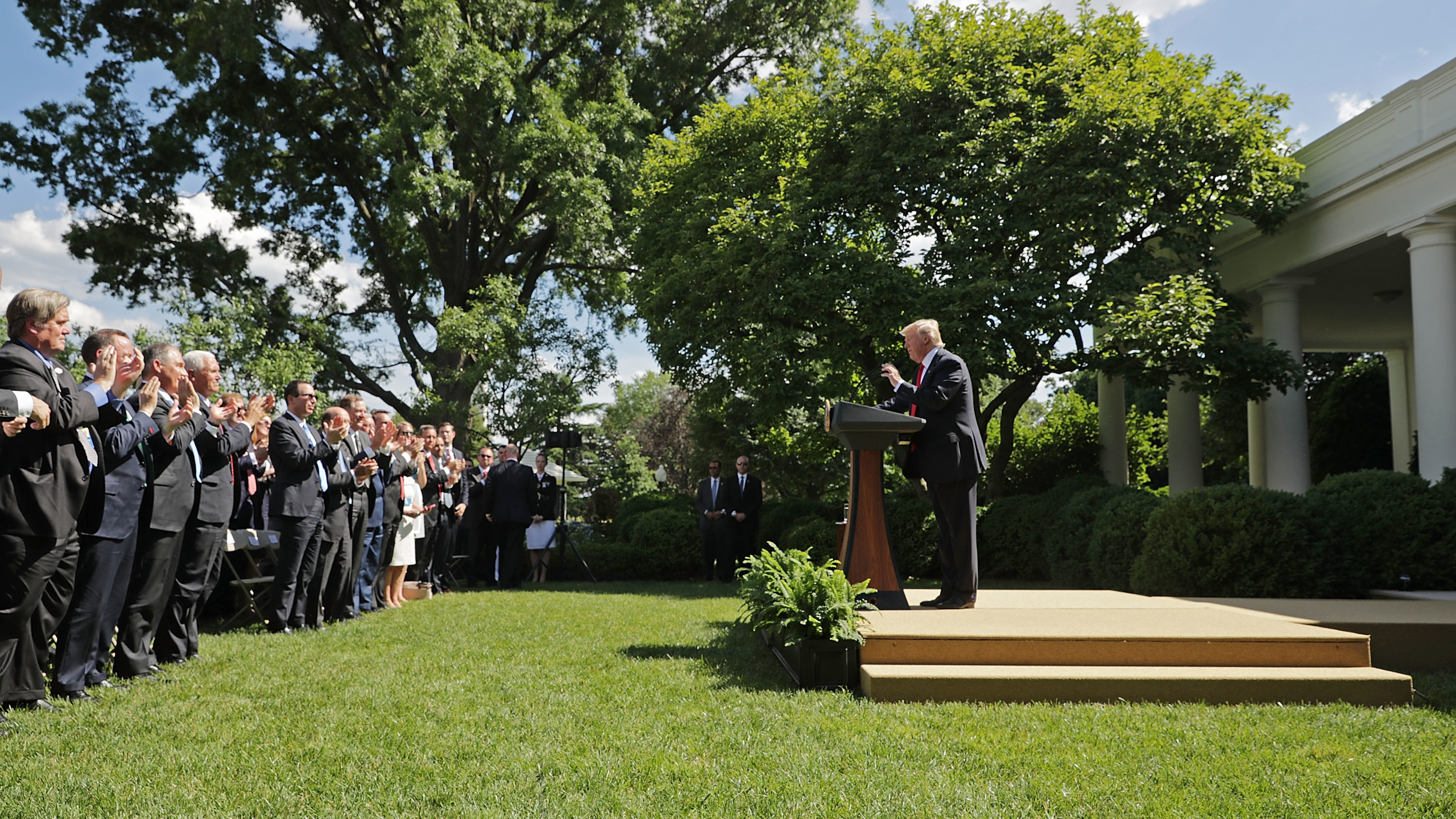 President Trump receives a standing ovation while announcing his decision to pull the United States out of the Paris climate agreement, June 1, 2017. (Getty Images)