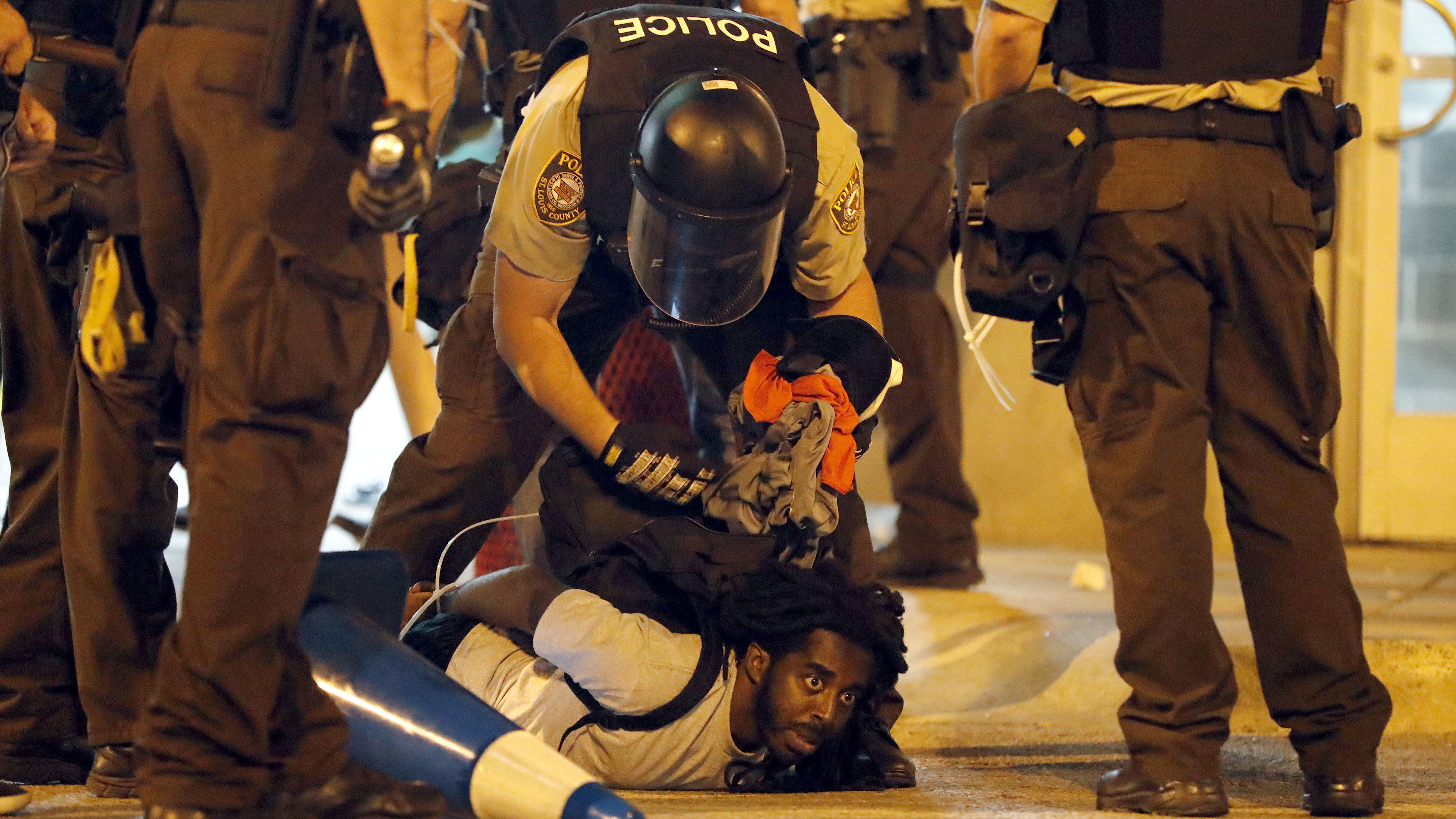 Police arrest a man on Sept. 17, 2017, in a protest against the acquittal of former police officer Jason Stockley in St. Louis.