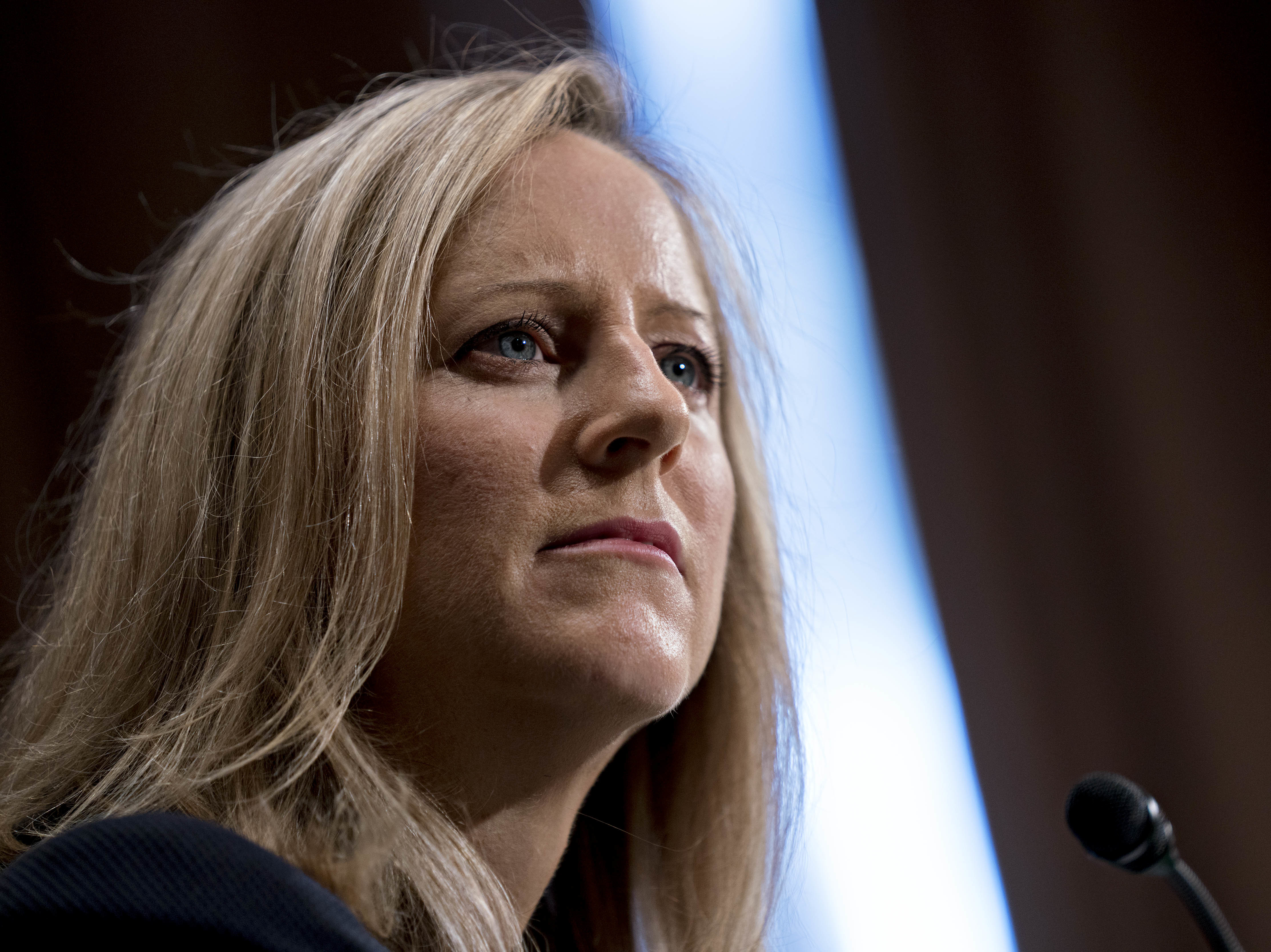 Kathy Kraninger listens during a Senate Banking Committee confirmation hearing in Washington, D.C., in July. On Thursday, she won Senate confirmation to run the Consumer Financial Protection Bureau. (Bloomberg via Getty Images)