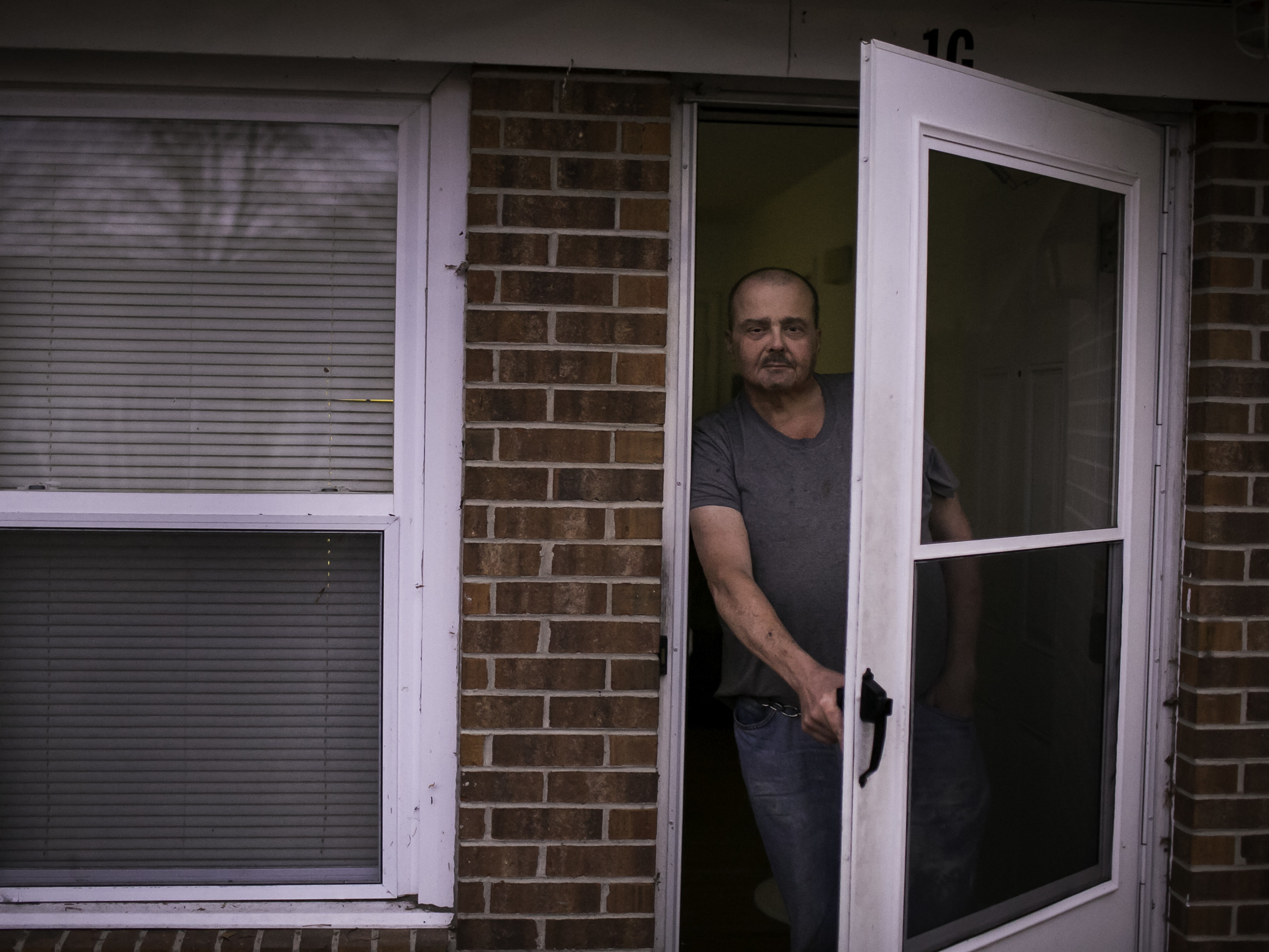 Stacy Holcomb, 57, stands in front of his home in Bladenboro, N.C., where he says he was approached by a woman during the midterm elections and offered assistance submitting an absentee ballot, an occurrence that many in Bladen County have said happened to them. (Justin Kase Conder for The Washington Post/Getty Images)