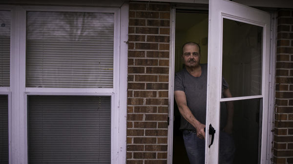 Stacy Holcomb, 57, stands in front of his home in Bladenboro, N.C., where he says he was approached by a woman during the midterm elections and offered assistance submitting an absentee ballot, an occurrence that many in Bladen County have said happened to them.