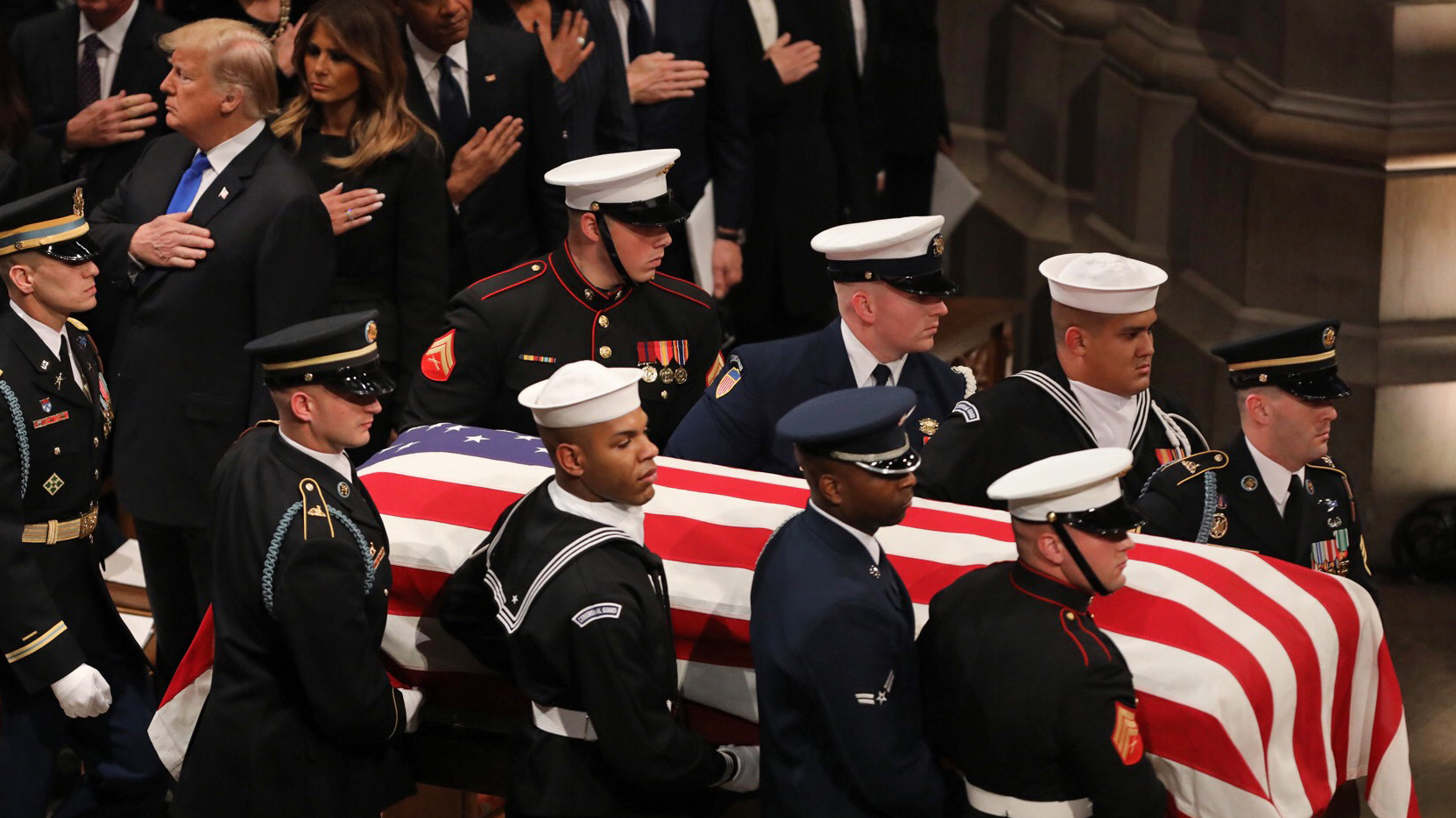 A military honor guard carries the casket of former President George H.W. Bush during the funeral at the National Cathedral in Washington, D.C. (Cheryl Diaz Meyer for NPR)