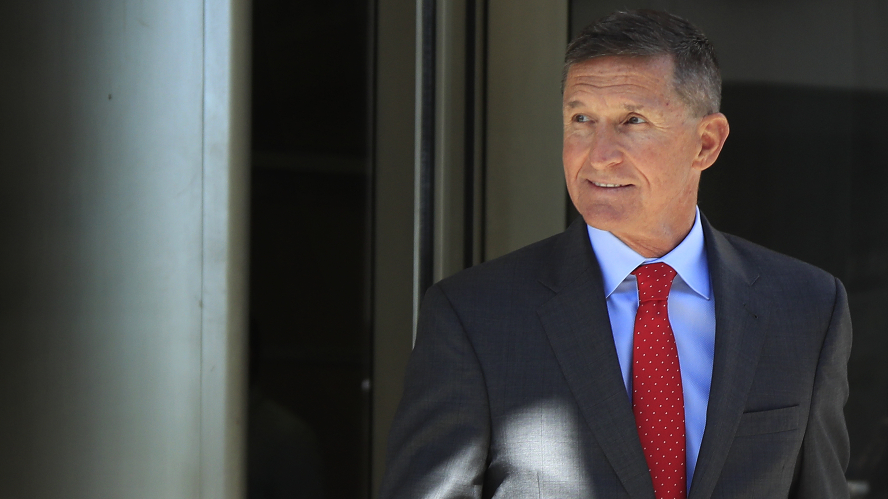 Former Trump national security adviser Michael Flynn leaves federal courthouse in Washington in July, following a status hearing.