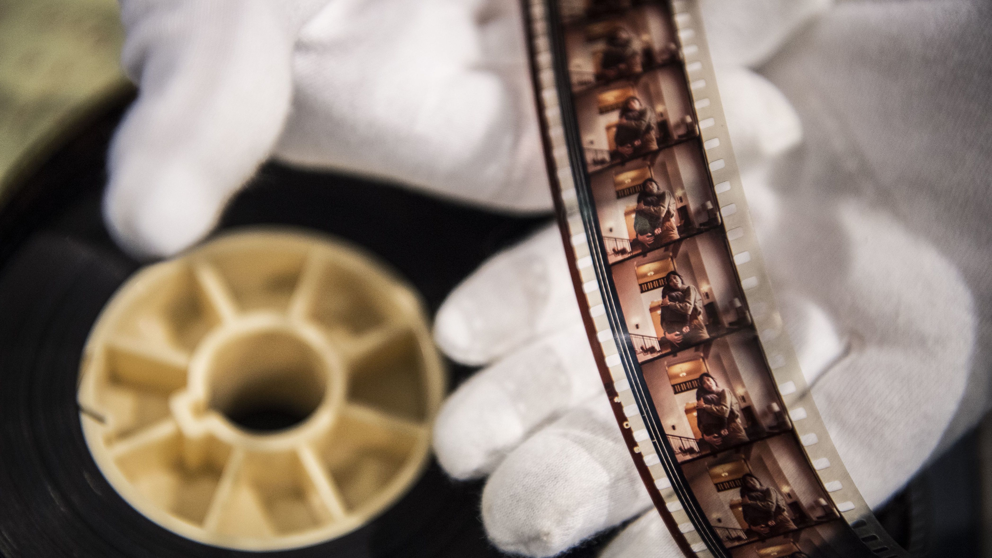 A man displays a rare cut from the film The Shining. The movie was recently added to the National Film Registry, as announced Wednesday.