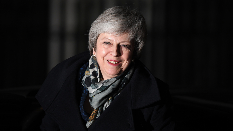 British Prime Minister Theresa May returns to No. 10 Downing St. after the no-confidence vote in London. May ultimately won that vote Wednesday and retained her leadership role in the Conservative Party. (Leon Neal/Getty Images)