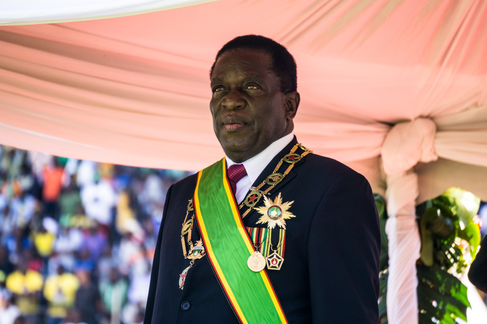 After 37 years of autocratic rule under Robert Mugabe, President Emmerson Mnangagwa promised a democratic era for Zimbabwe. But his government penalizes criticism. (Tendai Marima)
