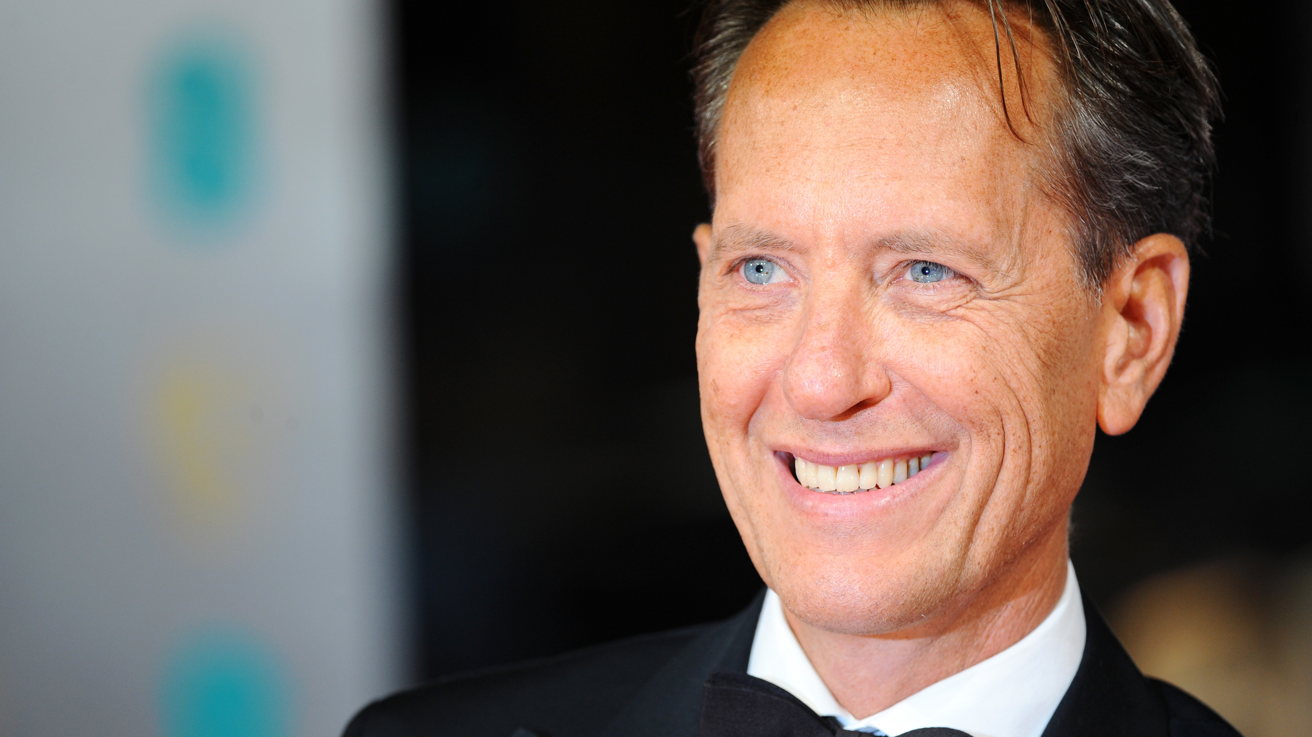 Richard E. Grant Barely Survived Childhood. Now He's Thriving As An