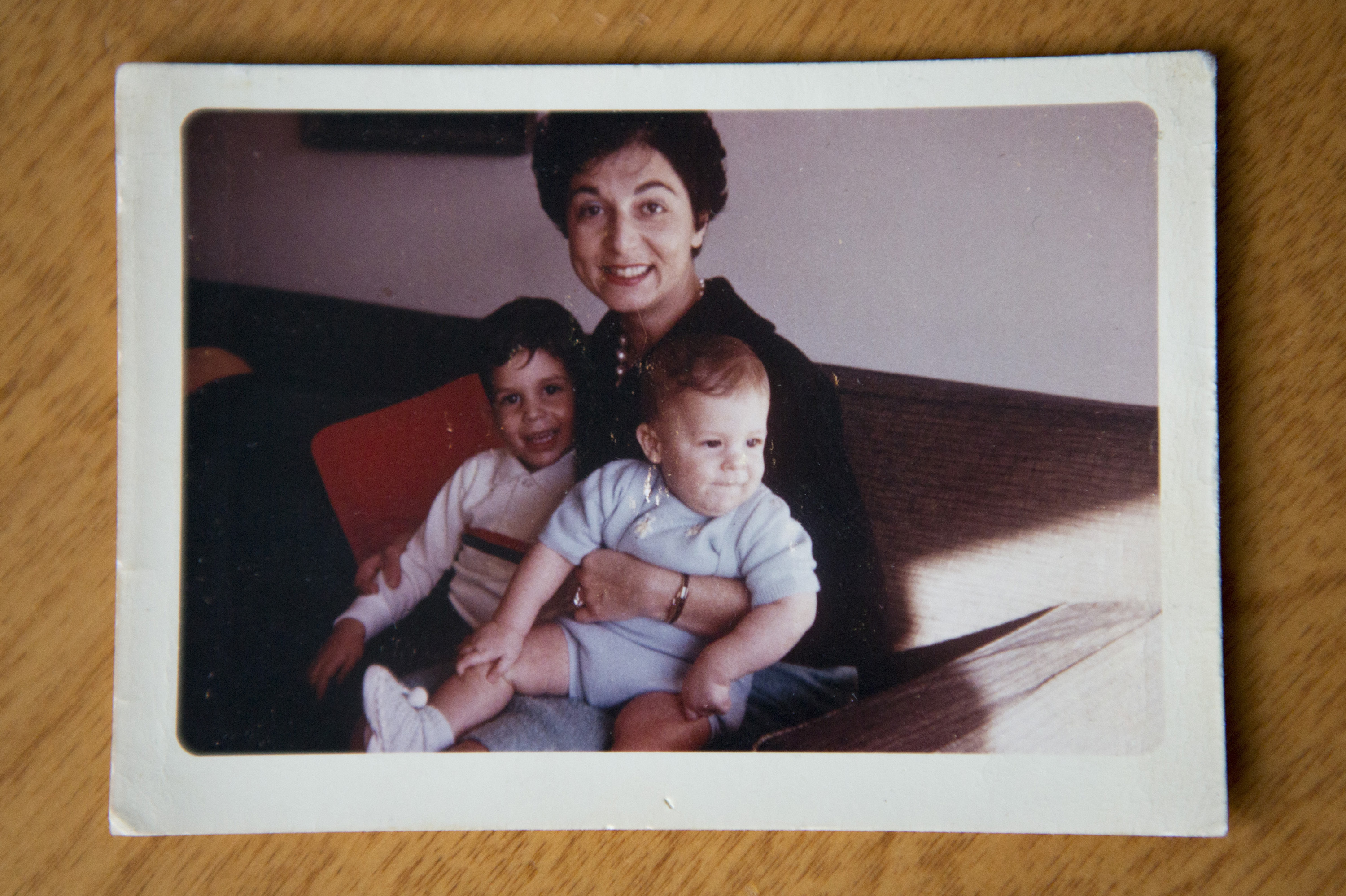 Bruce Auster's mother, Sylvia, holds him and his brother, Gordon, in an old family photograph. Her sons have only a few photographs of her from the years before she got sick with cancer; the audiotape helped bring back memories of her.