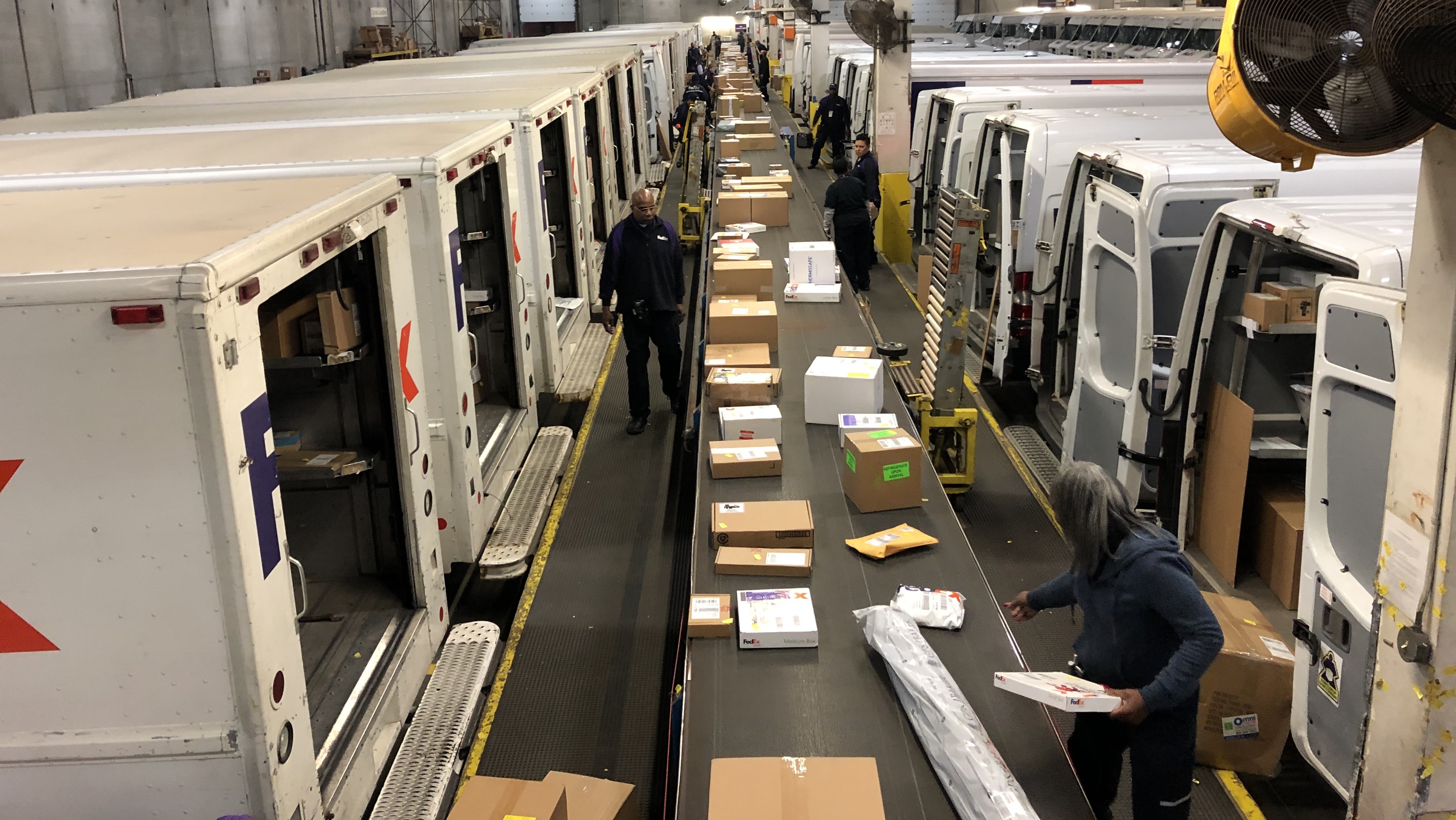 Trucks line up in unloading bays at the FedEx Express distribution center on Goose Island near downtown Chicago.