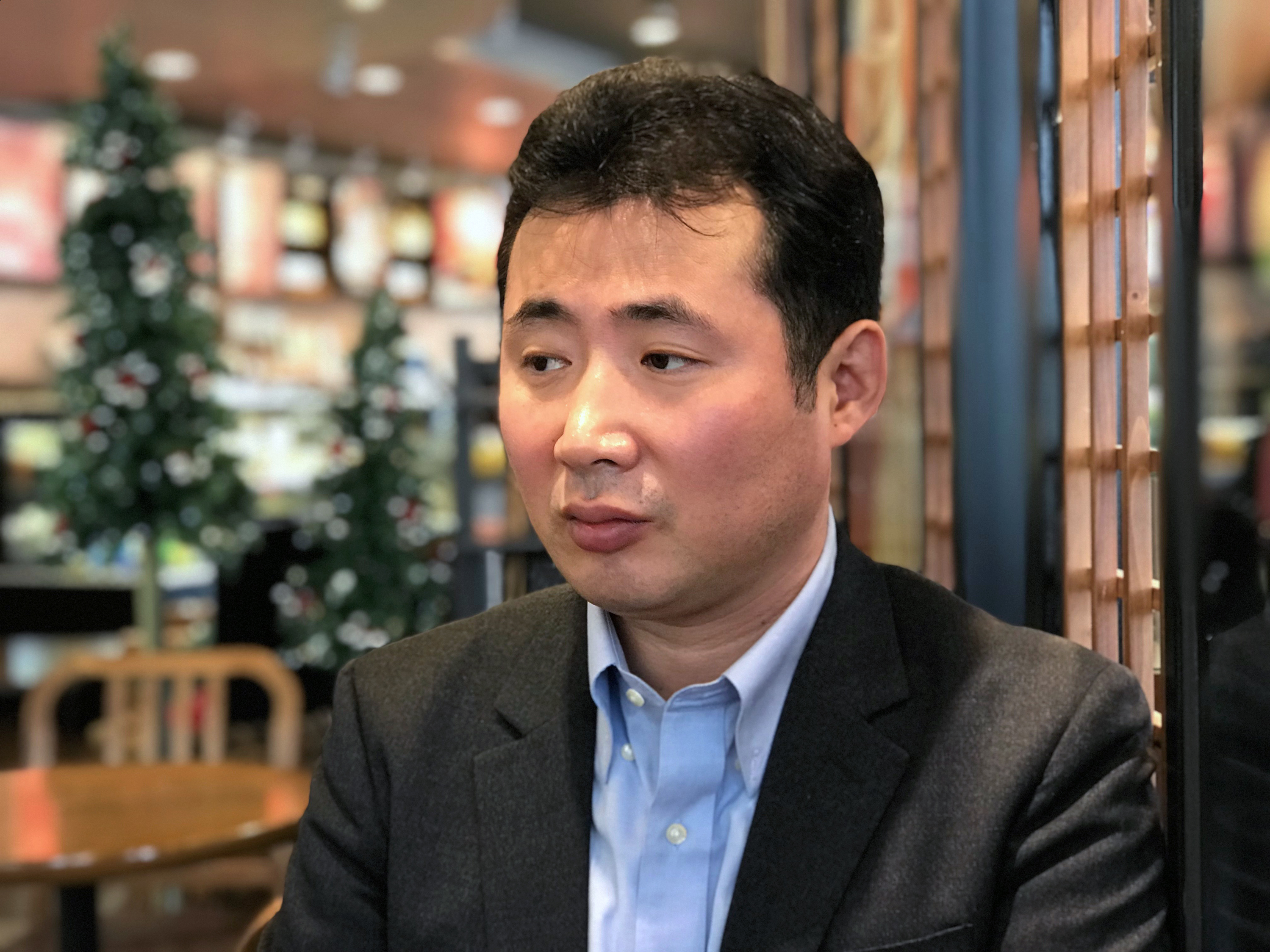 South Korean journalist and former North Korean defector Kim Myong Song speaks at a cafe in Seoul. The government's decision to ban him from covering an inter-Korean meeting raised concerns about press freedom.