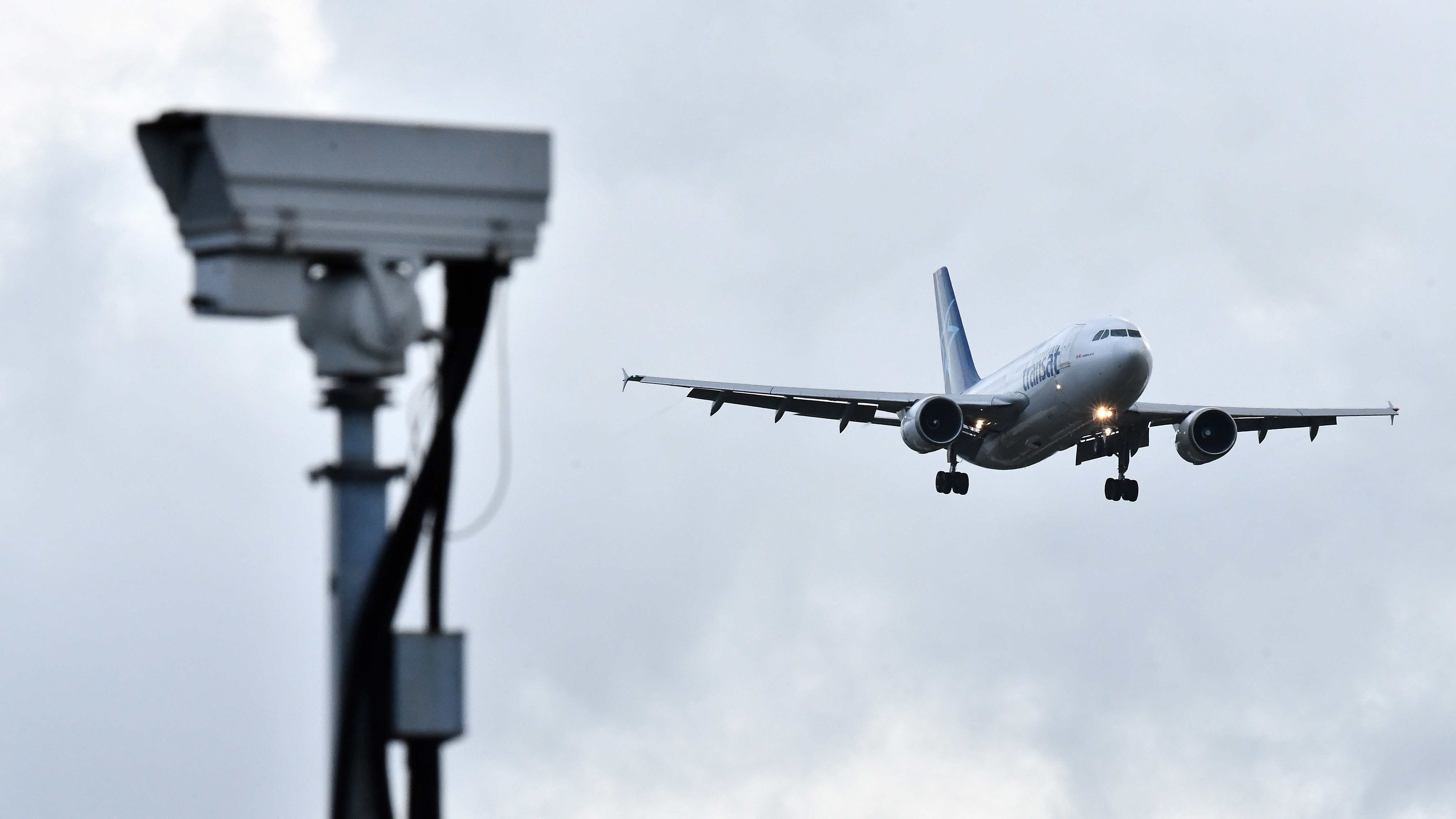 A jet lands at London Gatwick Airport on Friday. The airport had been closed for over a day after a drone repeatedly flew nearby. (AFP/Getty Images)