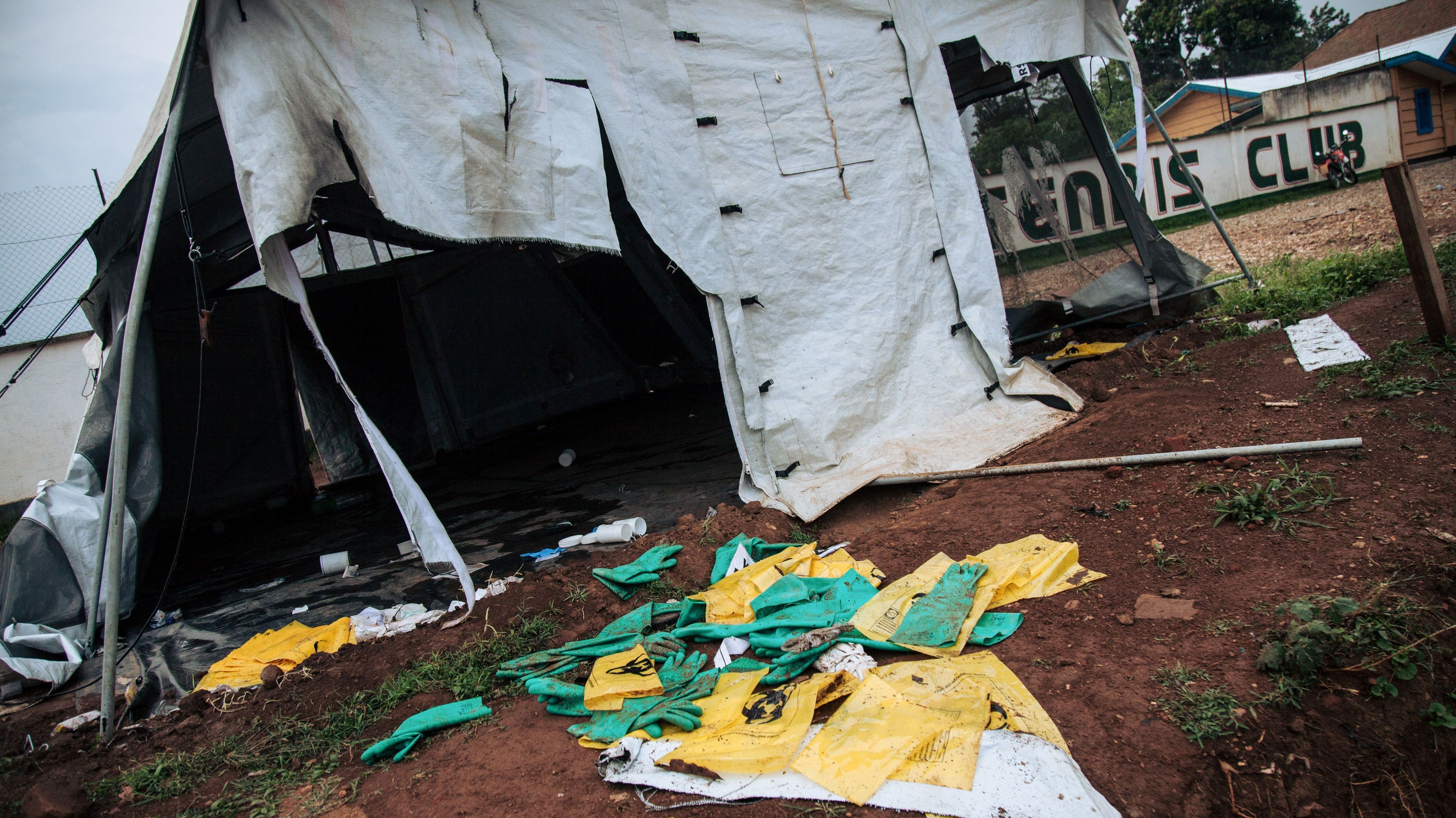 Protective equipment for Ebola care is left on the ground next to ransacked tents by demonstrators at the Ebola transit centre in Beni, following a demonstration last week against the postponement of elections in the territory of the Beni and the city of Butembo.