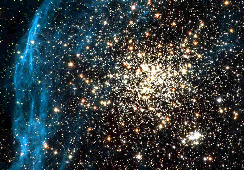 This image recorded by the Hubble telescope on July 10, 2001 shows two clusters of stars in a neighboring galaxy.