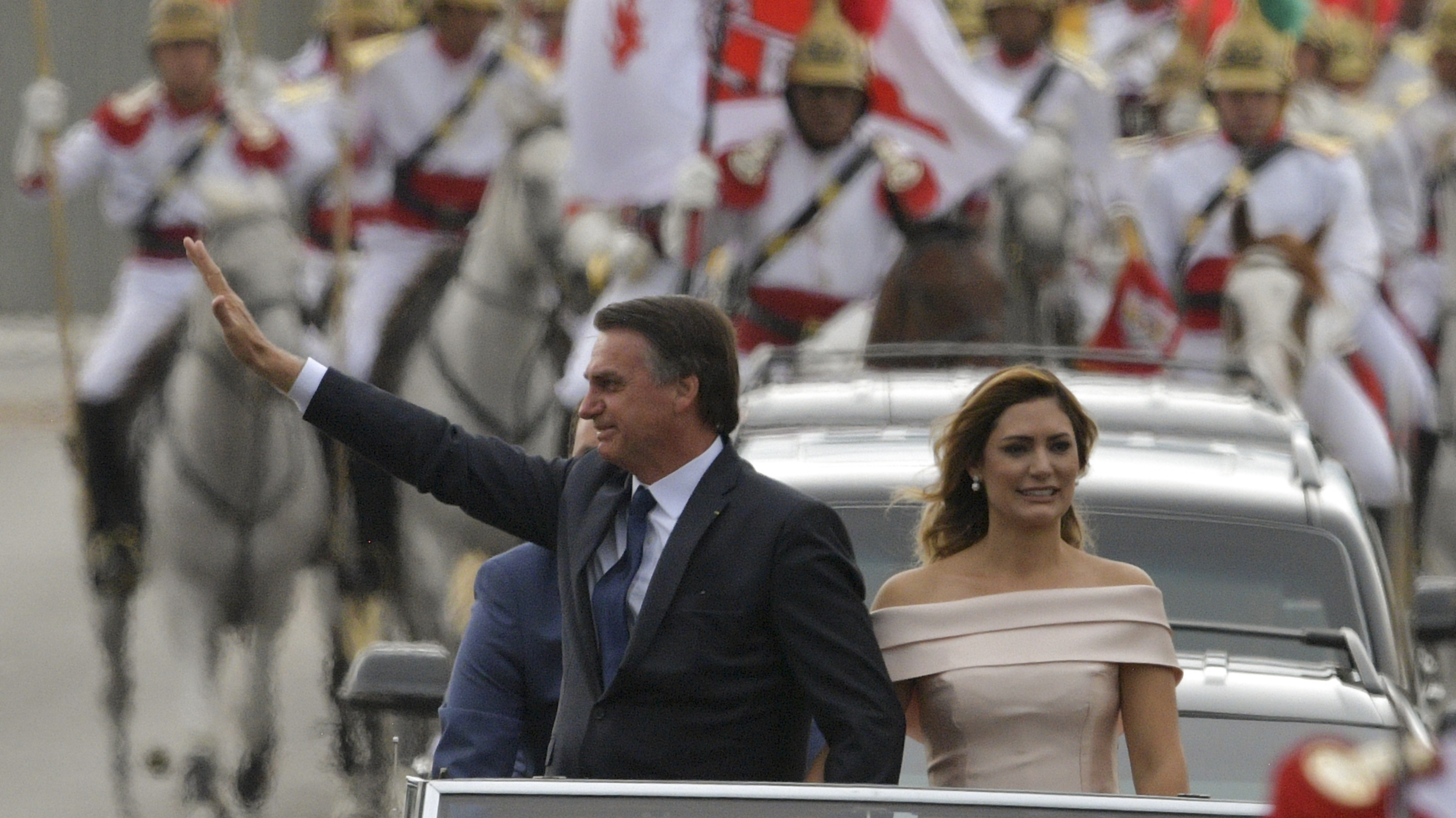 Brazil's President Jair Bolsonaro and his wife Michelle Bolsonaro head to the National Congress for his swearing-in ceremony, in Brasilia on Jan. 1. (AFP/Getty Images)