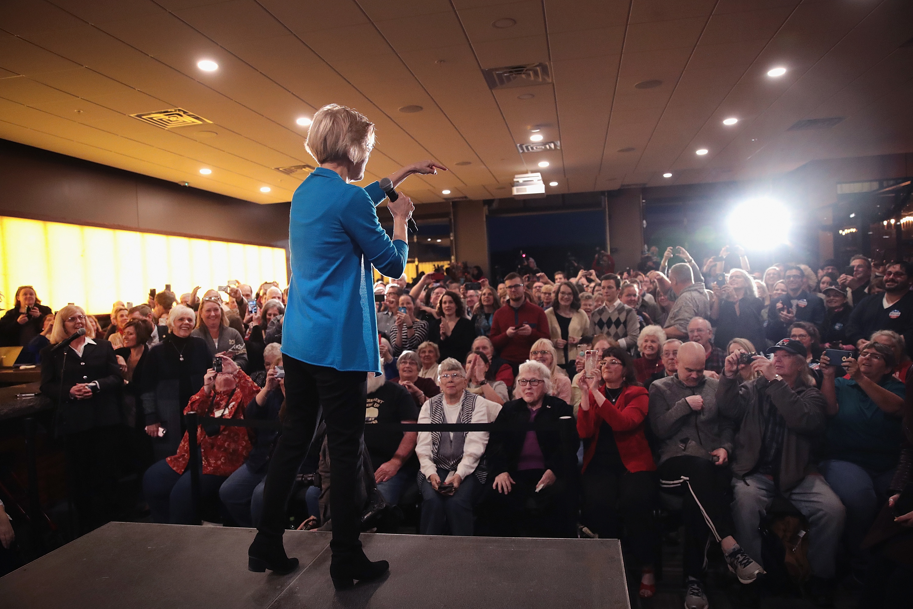 Sen. Elizabeth Warren, D-Mass., speaks to potential voters during a campaign stop on Friday in Council Bluffs, Iowa. (Getty Images)