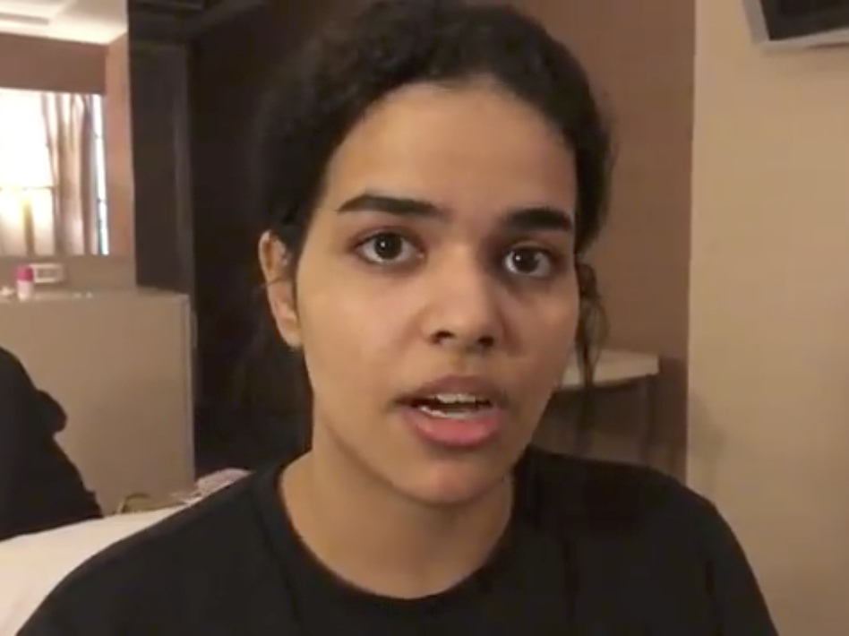 In this image made from video, Rahaf Mohammed Alqunun sat barricaded in a hotel room at an international airport in Bangkok. Alqunun asked for asylum in Australia, and Thai officials said they won't deport her for now. (Rahaf Mohammed Alqunun/Human Rights Watch via AP)