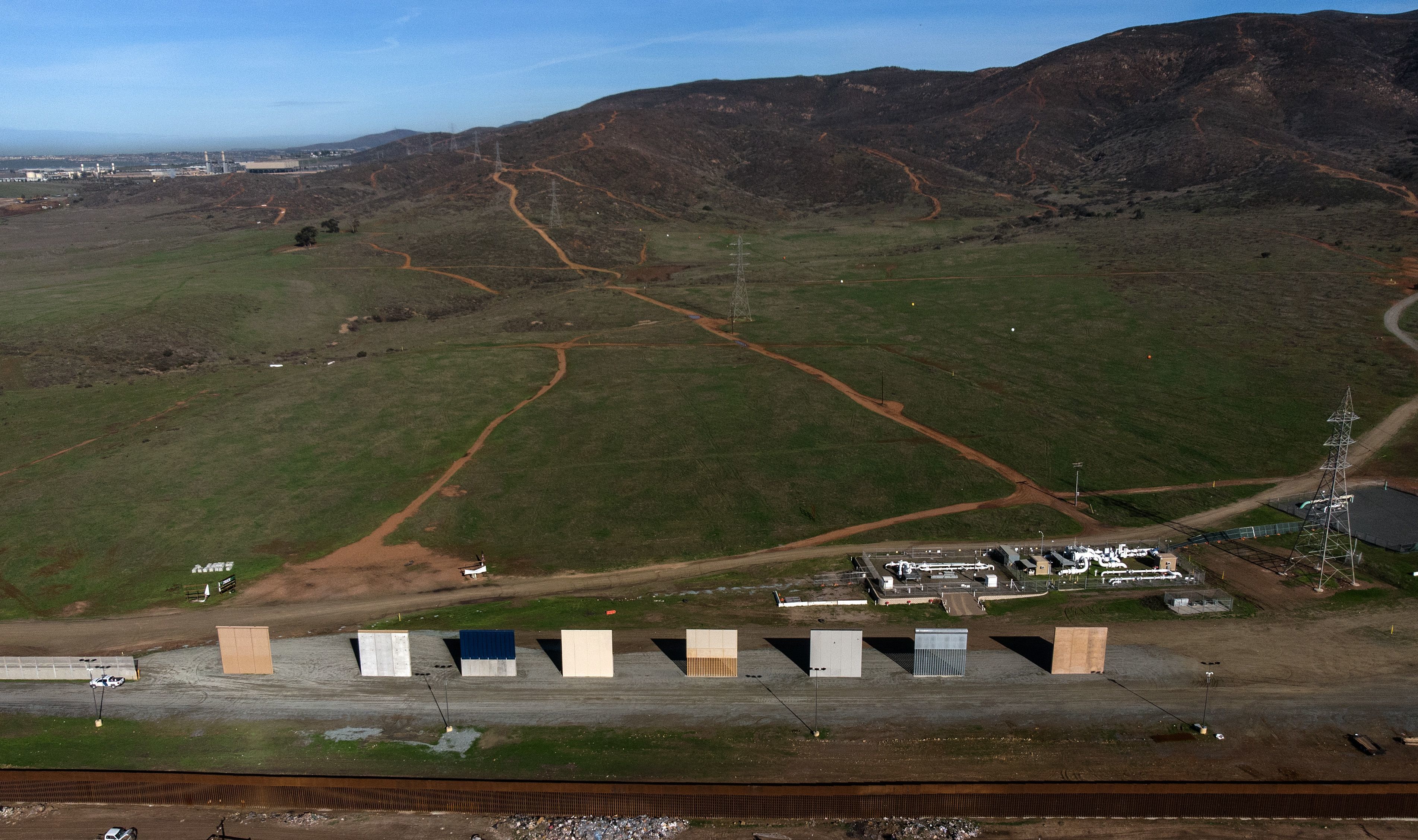 President Trump's border wall prototypes are seen from Tijuana in Baja California state, Mexico, on Monday. Trump has said he may invoke emergency powers to build a border wall if Congress doesn't agree to his demand for funding. (AFP/Getty Images)