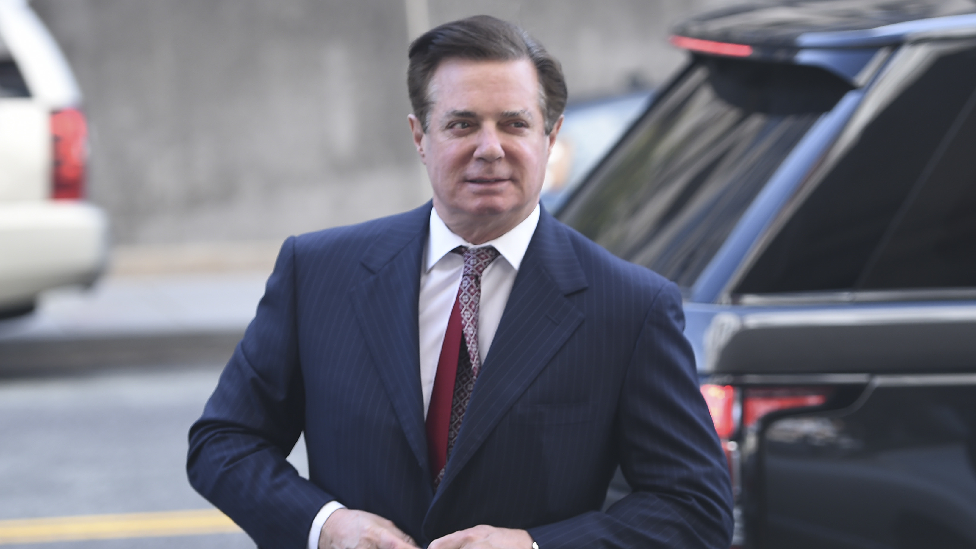 Paul Manafort arrives for a hearing at U.S. District Court in Washington, D.C., on June 15. A new court filing says Manafort is suspected of having shared polling data with a business associate who has links to the Russian intelligence service. (AFP/Getty Images)