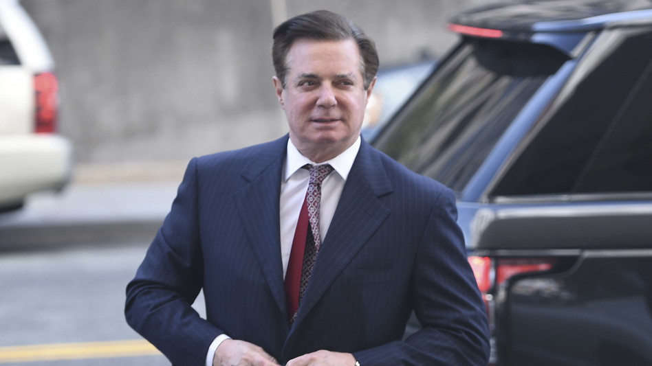 Paul Manafort arrives for a hearing at U.S. District Court in Washington, D.C., on June 15. A new court filing says Manafort is suspected of having shared polling data with a business associate who has links to the Russian intelligence service. (Brendan Smialowski/AFP/Getty Images)