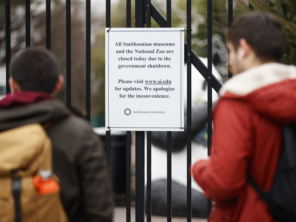 A sign posted outside the National Zoo earlier this month declares its closure, along with the closure of all Smithsonian museums. They were all on the wish list for Jill Rorem, whose family plans were undone by the shutdown. But she's not alone: The shutdown's ramifications on the arts have been felt far beyond the Beltway. (Carolyn Kaster/AP)