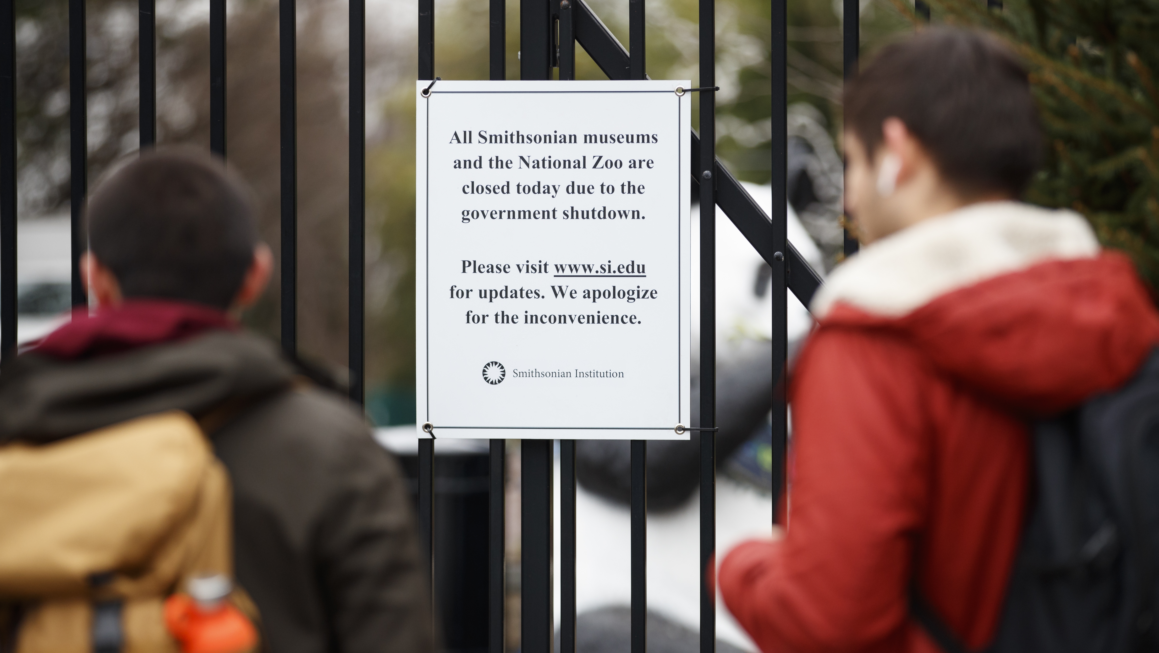 A sign posted outside the National Zoo earlier this month declares its closure, along with the closure of all Smithsonian museums. They were all on the wish list for Jill Rorem, whose family plans were undone by the shutdown. But she