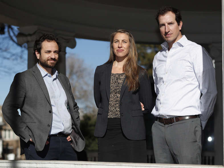 Attorneys, from left, David Seligman, Nina DiSalvo and Alexander Hood of Denver's Towards Justice, which filed a lawsuit on behalf of au pairs for higher pay. (David Zalubowski/AP)