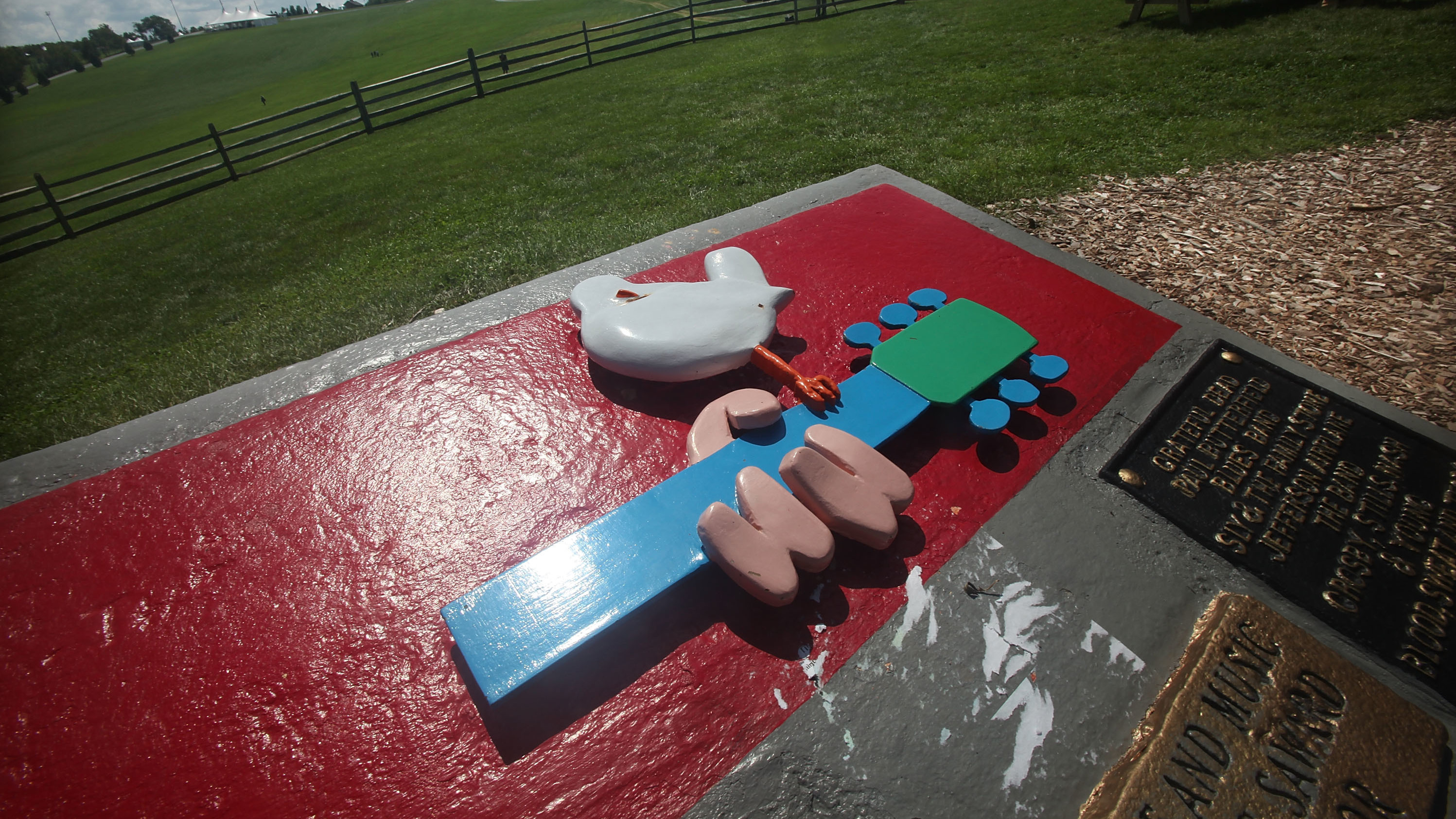 A plaque marks the site of the original Woodstock festival in Bethel, N.Y.