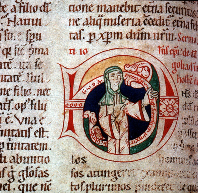 This image shows Guda, a 12th century nun, and the inscription reads, "Guda, a sinful woman, wrote and painted this book." It's a rare example of a manuscript signed by a female scribe.