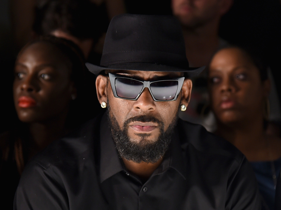 R. Kelly attends a show at New York Fashion Week in July 2015. Through years of sex misconduct accusations, he has denied committing any wrongdoing.